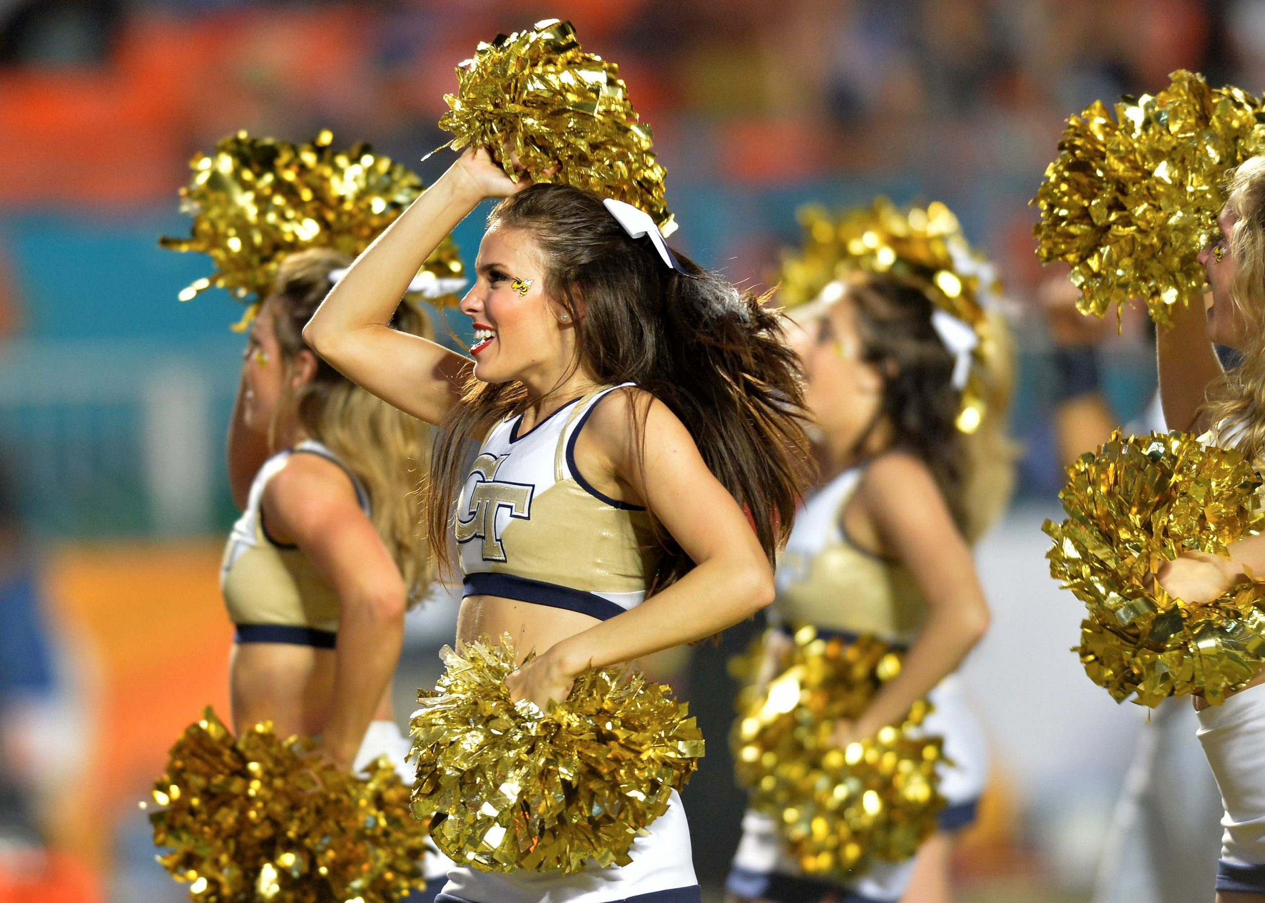 Dec 31, 2014; Miami Gardens, FL, USA; Georgia Tech Yellow Jackets cheerleaders perform during the fourth quarter against the Mississippi State Bulldogs in the 2014 Orange Bowl at Sun Life Stadium. Georgia Tech Yellow Jackets won 49-34. Mandatory Credit: Steve Mitchell-USA TODAY Sports