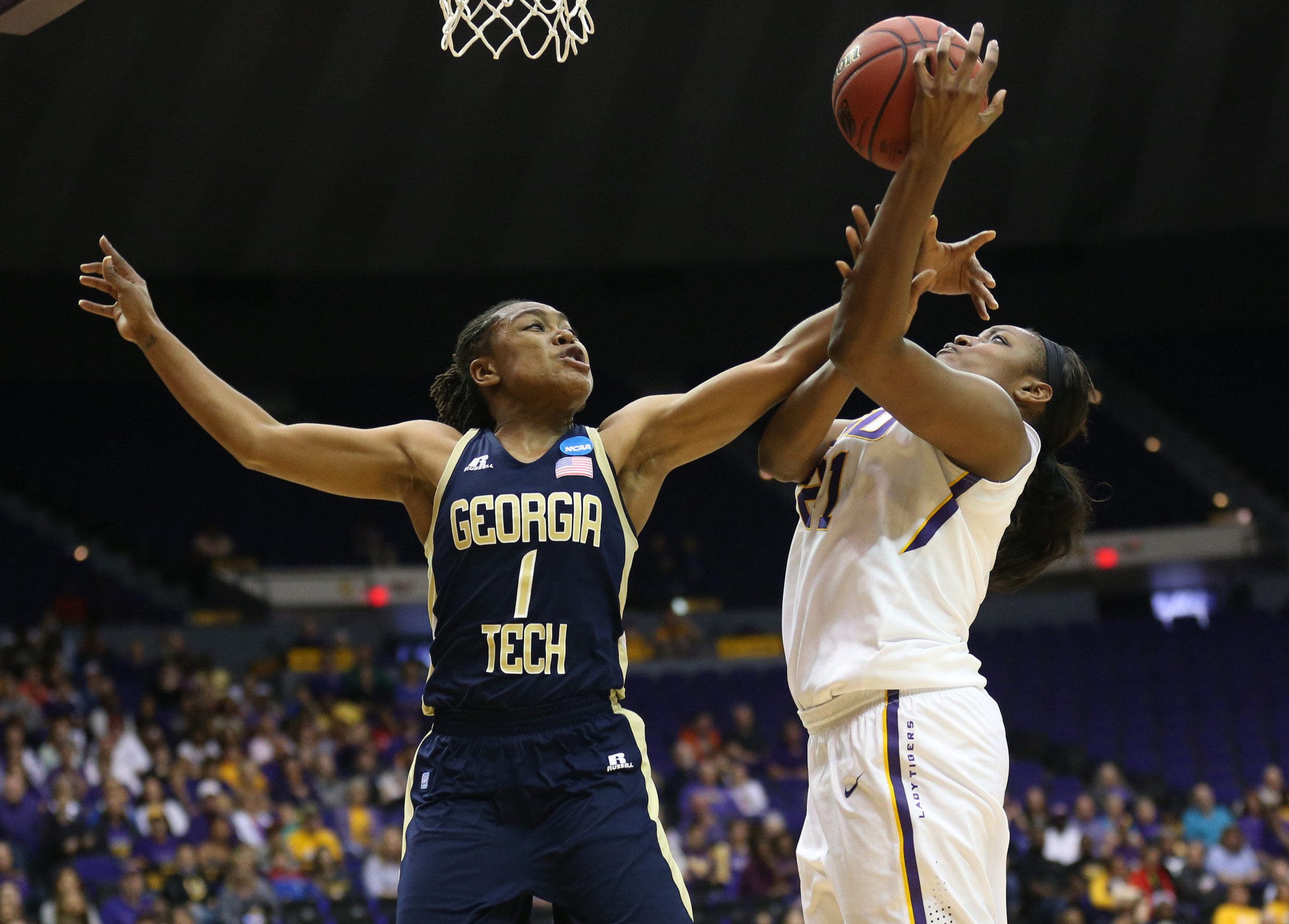 Mar 23, 2014; Baton Rouge, LA, USA; Georgia Tech Yellow Jackets guard Dawnn Maye (1) fights to get the ball from LSU Tigers forward Shanece McKinney (21) in the second half of a women's college basketball game in the first round of the NCAA Tournament at the Pete Maravich Assembly Center. LSU defeated Georgia Tech 98-78. Mandatory Credit: Crystal LoGiudice-USA TODAY Sports