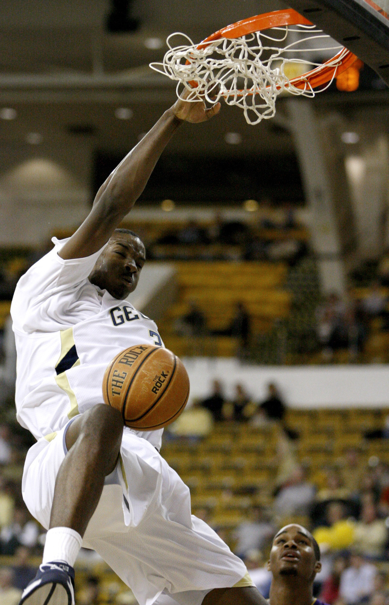 Gani Lawal dunks as Tennessee Tech's Anthony Fisher watches during the second half. (AP Photo/Josh D. Weiss)