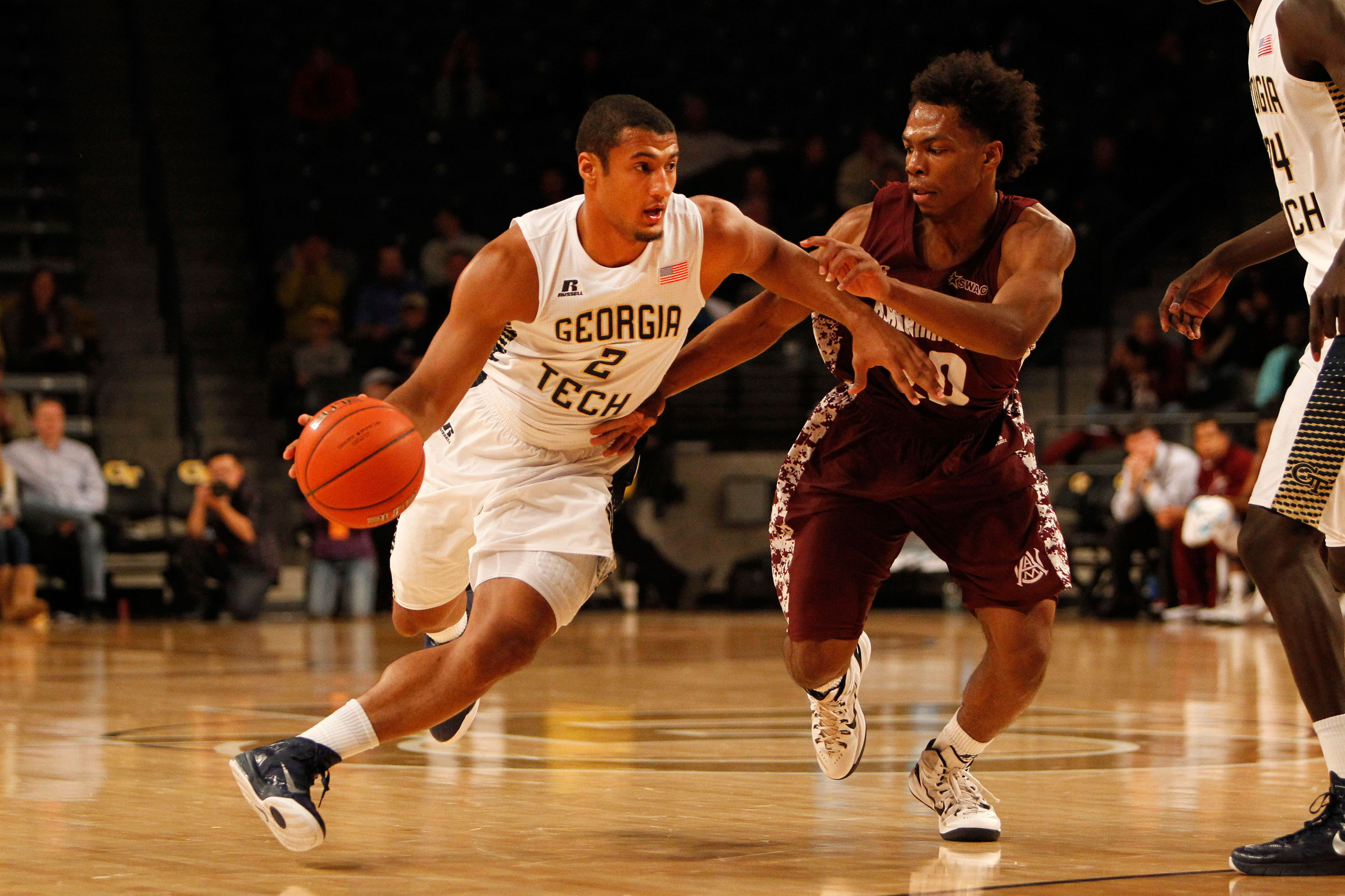 Nov 18, 2014; Atlanta, GA, USA; Yellow Jackets guard Chris Bolden (2) is defended by Alabama A&M Bulldogs guard Zachary Jackson (20) in the second half. Brett Davis-USA TODAY Sports