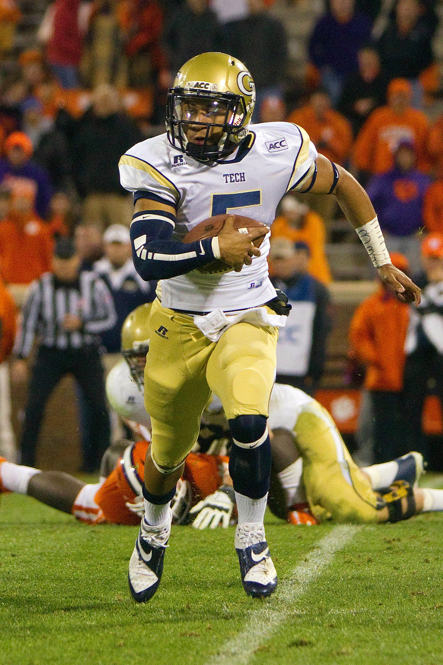 Nov 14, 2013; Clemson, SC, USA; Georgia Tech Yellow Jackets quarterback Justin Thomas (5) carries the ball during the fourth quarter against the Clemson Tigers at Clemson Memorial Stadium. Clemson won 55-31. Mandatory Credit: Joshua S. Kelly-USA TODAY Sports