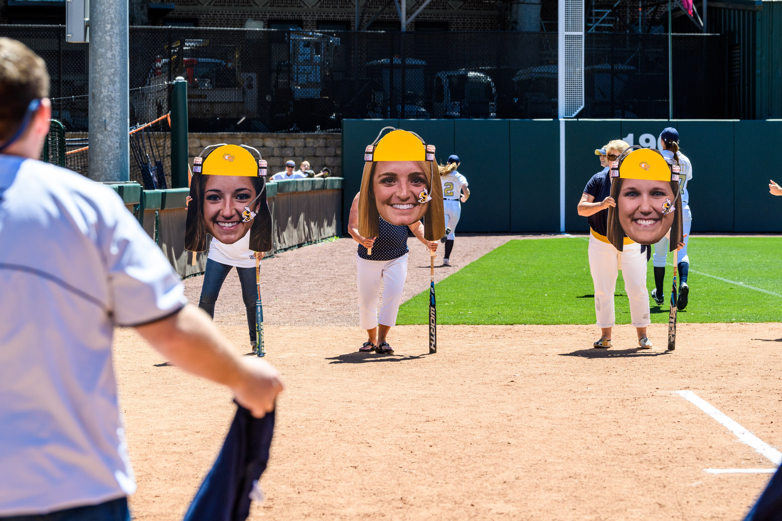 The senior moms participate in the dizzy bat race