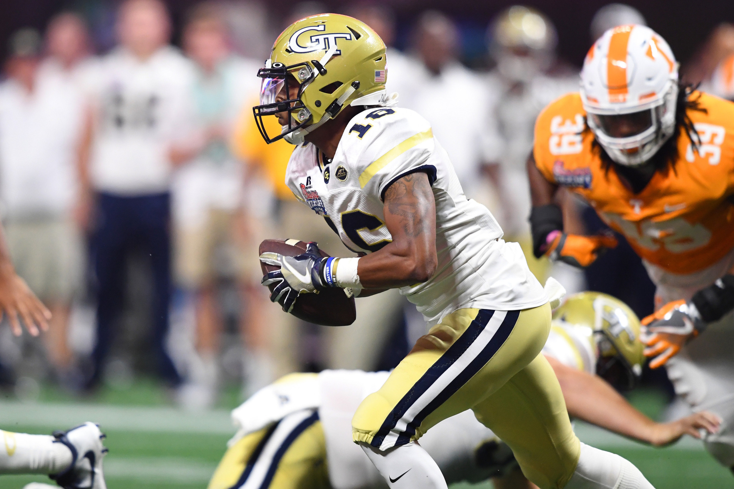 Sep 4, 2017; Atlanta, GA, USA; Georgia Tech Yellow Jackets quarterback TaQuon Marshall (16) runs the ball against the Tennessee Volunteers during the first quarter at Mercedes-Benz Stadium. Mandatory Credit: John David Mercer-USA TODAY Sports