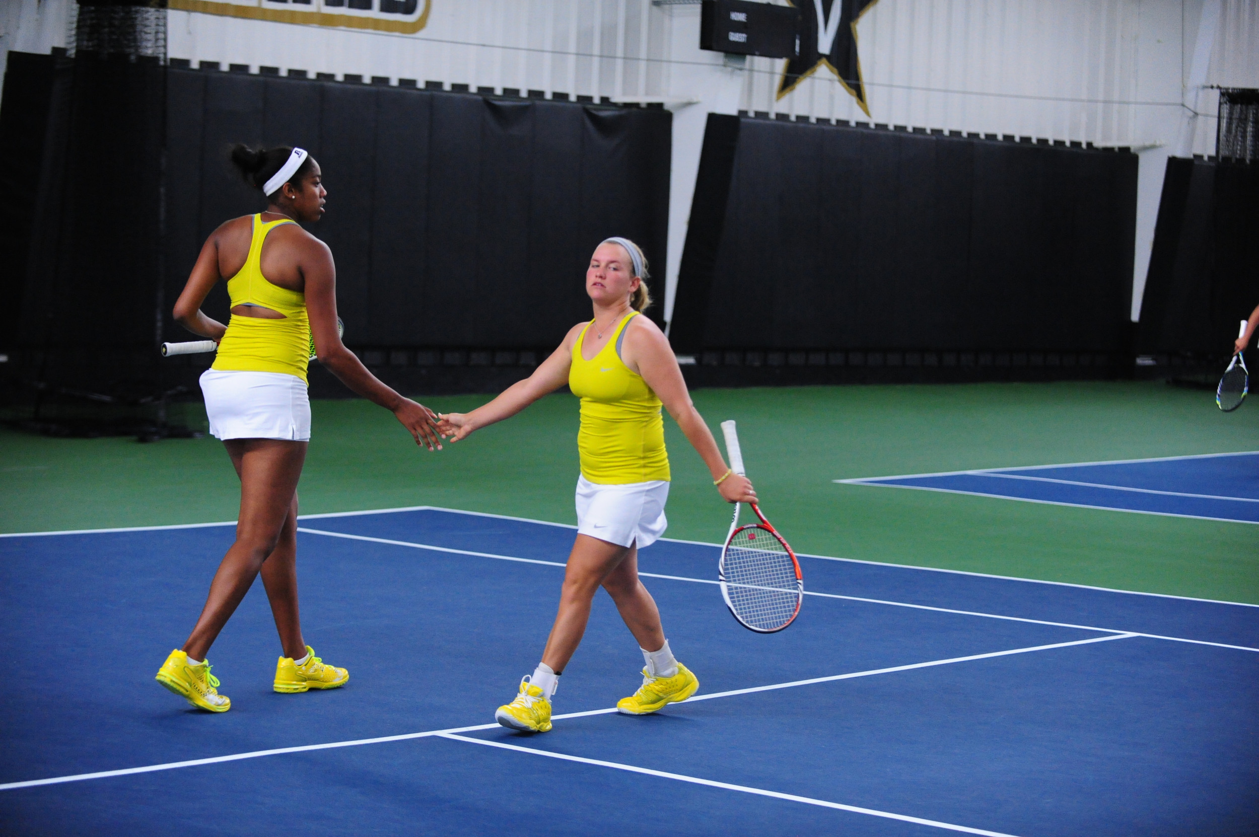 Megan Kurey and Kendal Woodard play doubles against Purdue during the first round of the NCAA Tournament in Nashville.