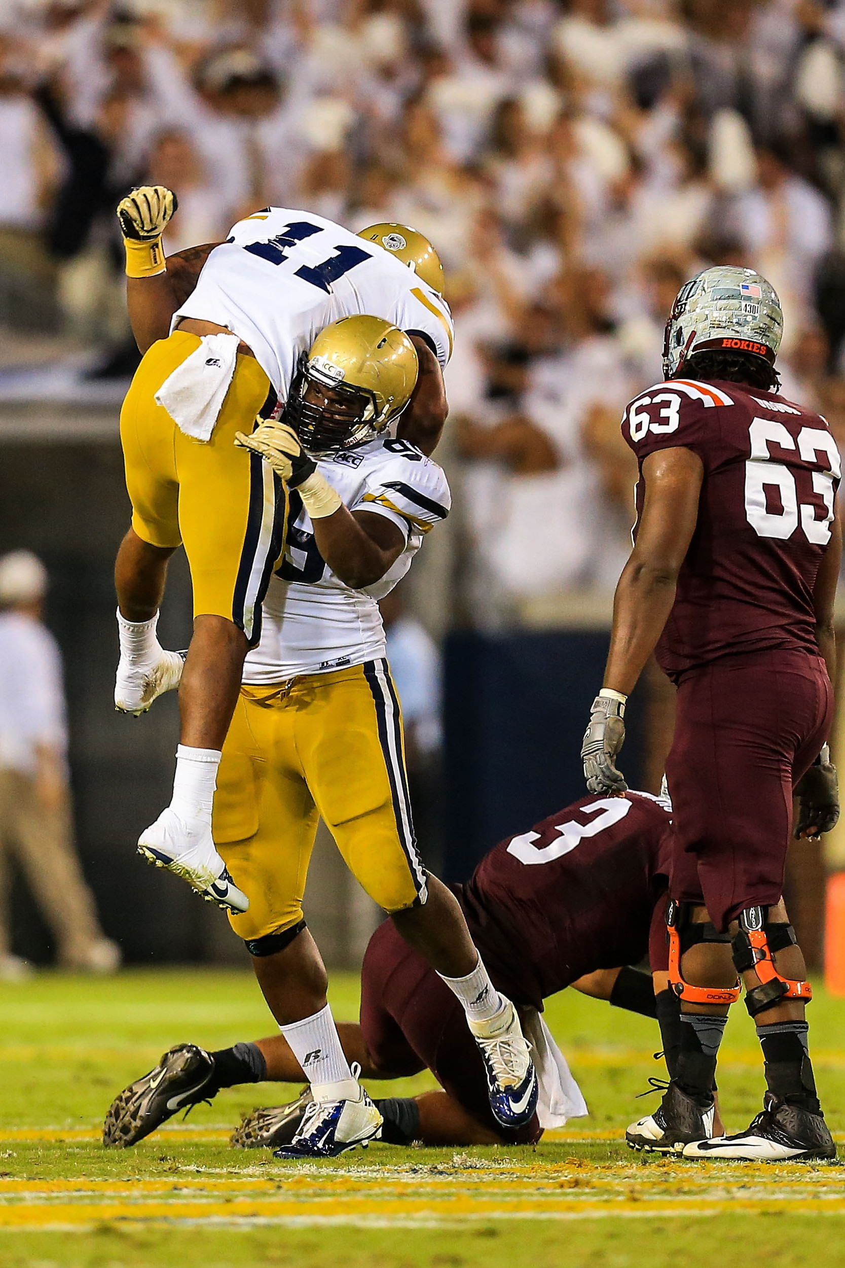 Defensive tackle Euclid Cummings (99) celebrates a sack with cornerback Kendall Fuller (11). Mandatory Credit: Daniel Shirey-USA TODAY Sports