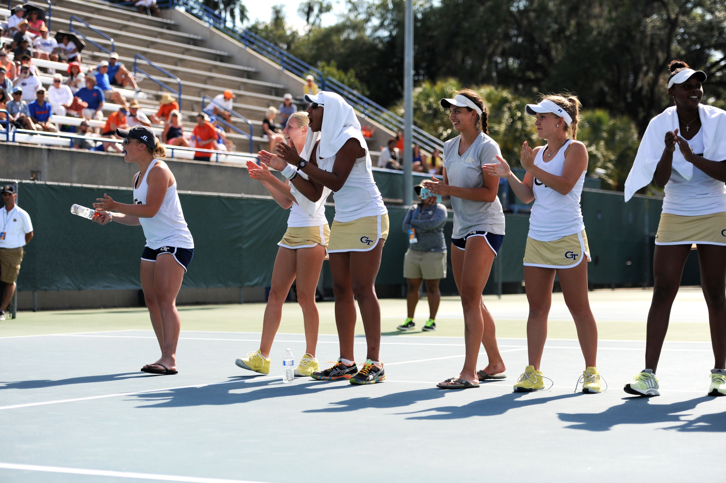 The Jackets cheer on Megan Kurey as she battled for the match-winning point (Credit: Christine Casey)