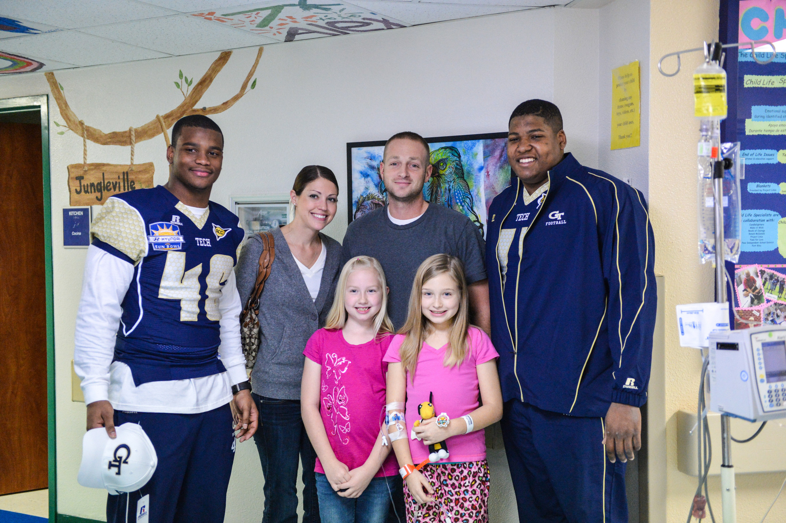 Coach Paul Johnson and 27 Yellow Jacket Football players visited Providence Memorial Hospital in El Paso to spread some Georgia Tech cheer to the children there.