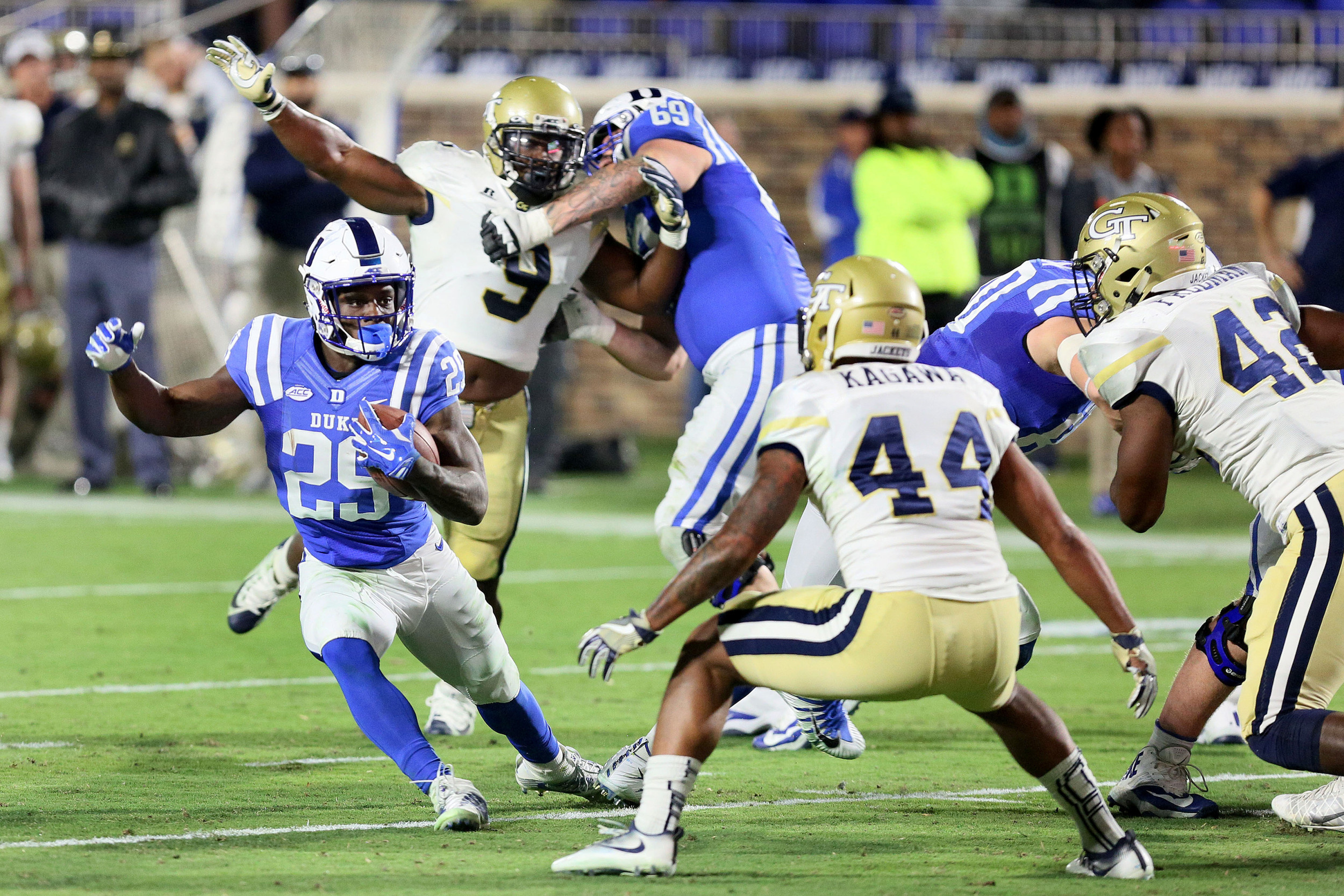 Nov 18, 2017; Durham, NC, USA; Duke Blue Devils running back Shaun Wilson (29) looks for running room against the Georgia Tech Yellow Jackets in the second half at Wallace Wade Stadium. Duke beat the Georgia Tech 42-20. Mandatory Credit: Mark Dolejs-USA TODAY Sports