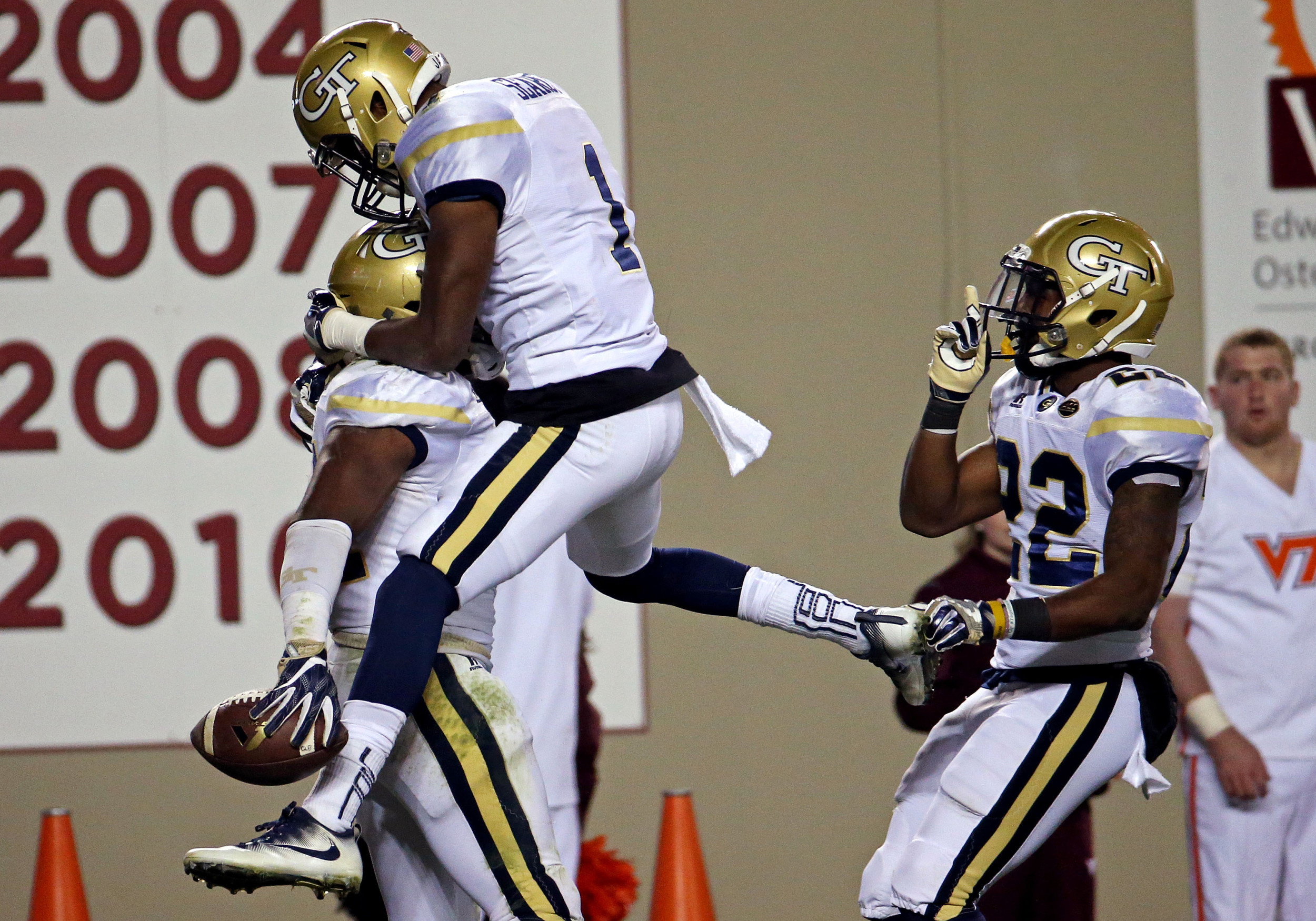 Blacksburg, VA; Georgia Tech Yellow Jackets running back Marcus Marshall celebrates with running back Qua Searcy after scoring a touchdown against the Virginia Tech Hokies during the third quarter at Lane Stadium. Credit: Peter Casey-USA TODAY Sports