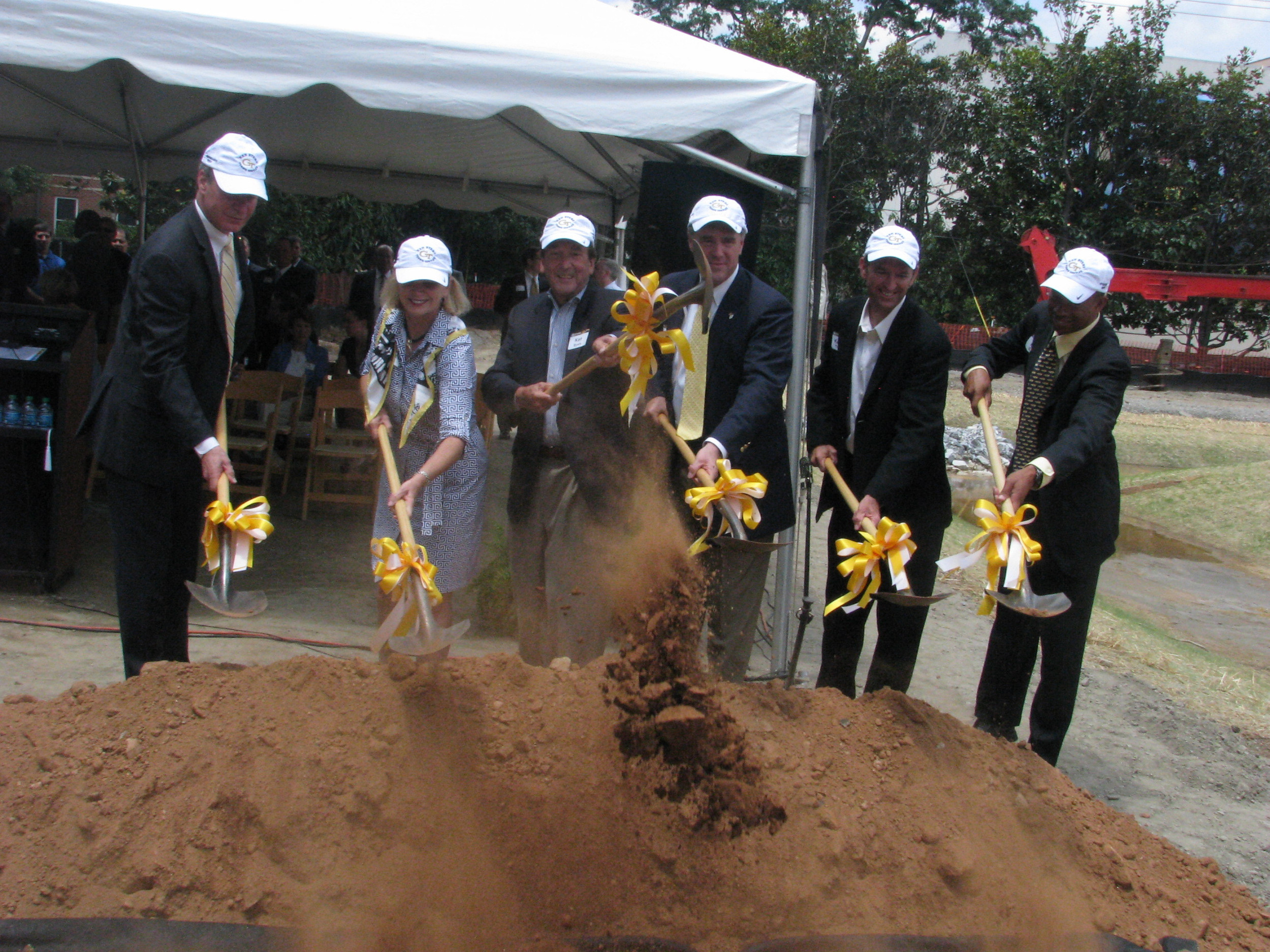 President Bud Peterson, Trish and Ken Byers, Dan Radakovich, Bryan Shelton and Kenny Thorne dig the first dirt at the Ken Byers Tennis Complex Groundbreaking Ceremony, June 15, 2012.