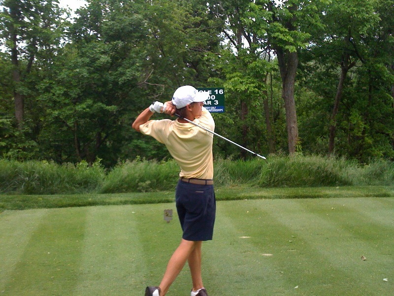John-Tyler Griffin teeing off during Wednesday's practice round at Olde Stone.