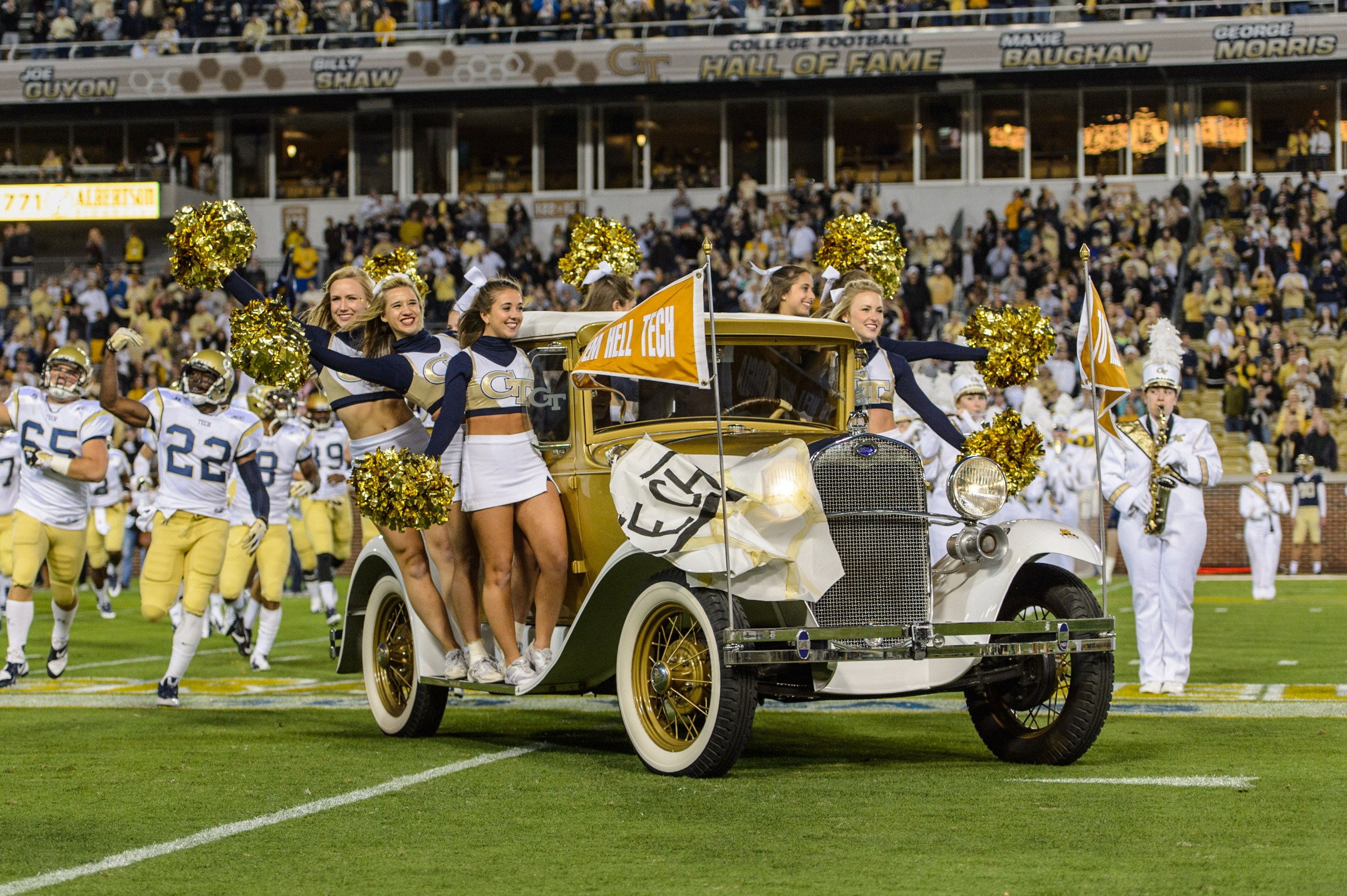 The Ramblin' Reck leads the team onto the field.
