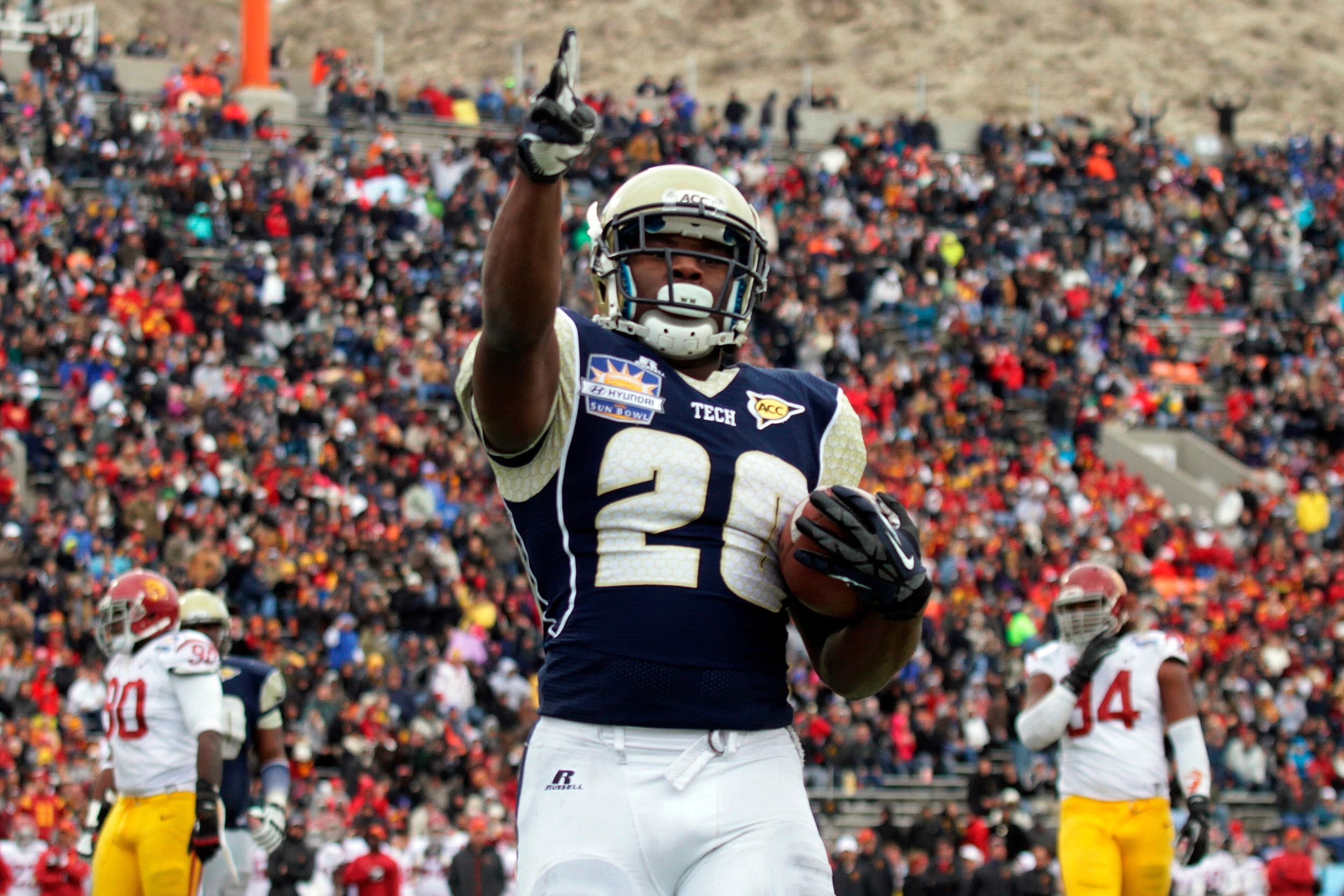 Georgia Tech running back David Sims celebrates his touchdown against Southern California during the first half of the Sun Bowl NCAA college football game, Monday, Dec. 31, 2012, in El Paso, Texas. (AP Photo/Mark Lambie)