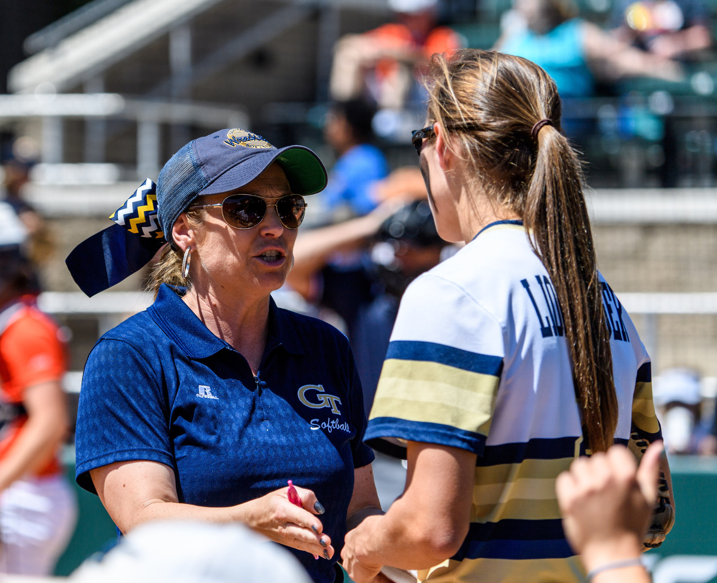 Coach Shelly Hoerner, Maddie Lionberger (2)