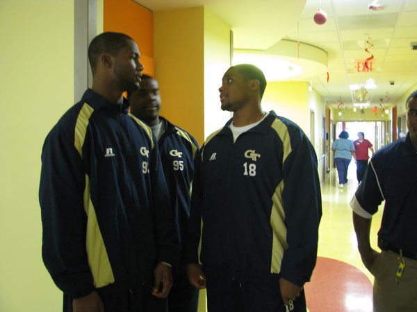 Yellow Jackets visit children at Egleston Hospital.
