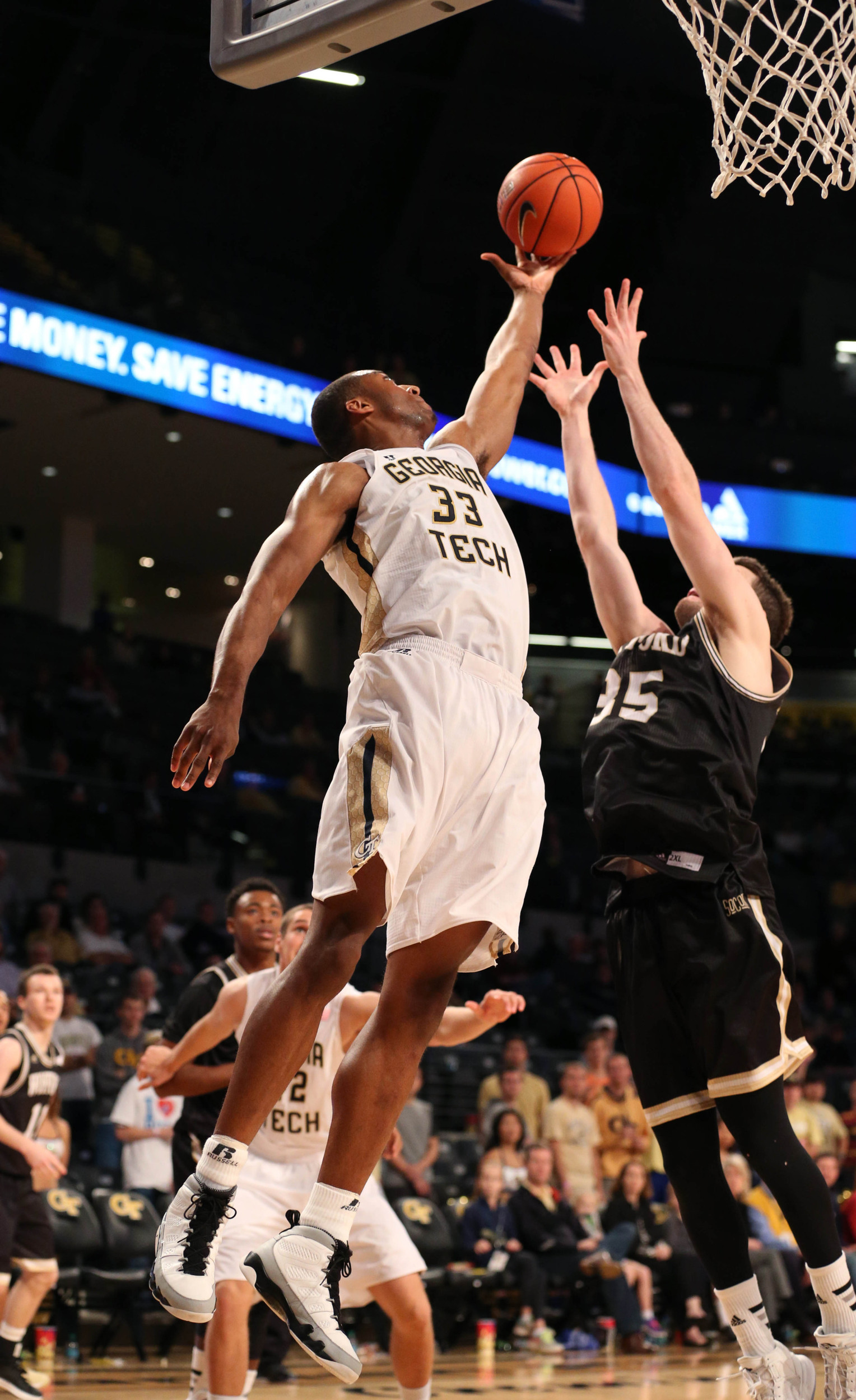 Dec 1, 2015; Atlanta, GA, USA; Georgia Tech Yellow Jackets forward James White (33) fights for a rebound against Wofford Terriers forward Ryan Sawvell (35) in the second half of their game at McCamish Pavilion. The Yellow Jackets won 77-61. Mandatory Credit: Jason Getz-USA TODAY Sports