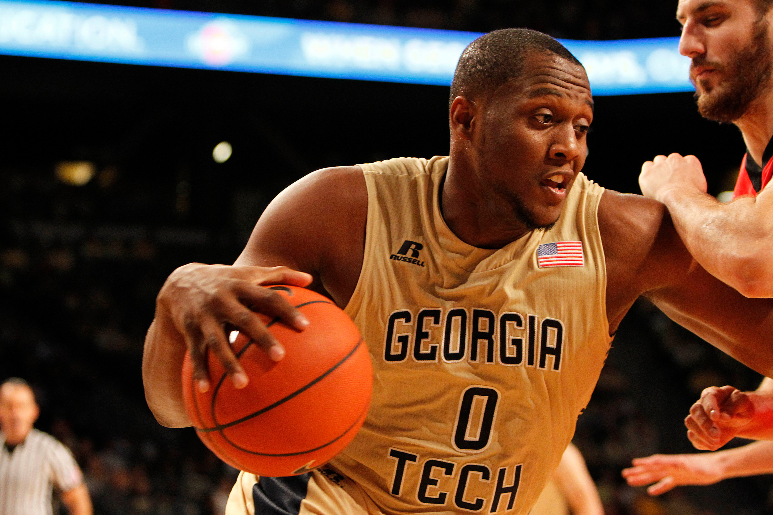 Nov 14, 2014; Atlanta, GA, USA; Georgia Tech Yellow Jackets forward Charles Mitchell (0) drives to the basket against the Georgia Bulldogs in the first half at McCamish Pavilion.