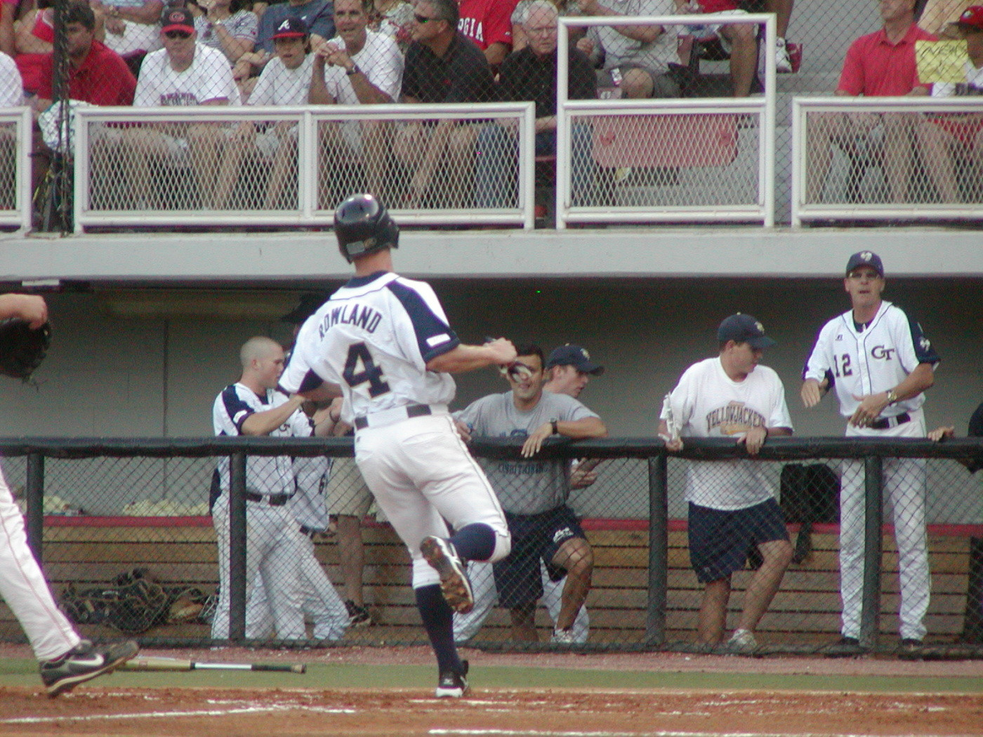 Jeff Rowland scores on a passed ball.