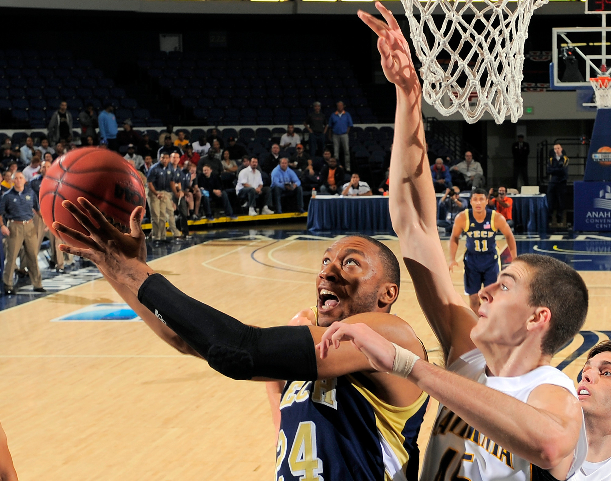 Kammeon Holsey, left, goes up for a shot as California's David Kravish defends. (AP Photo/Mark J. Terrill)