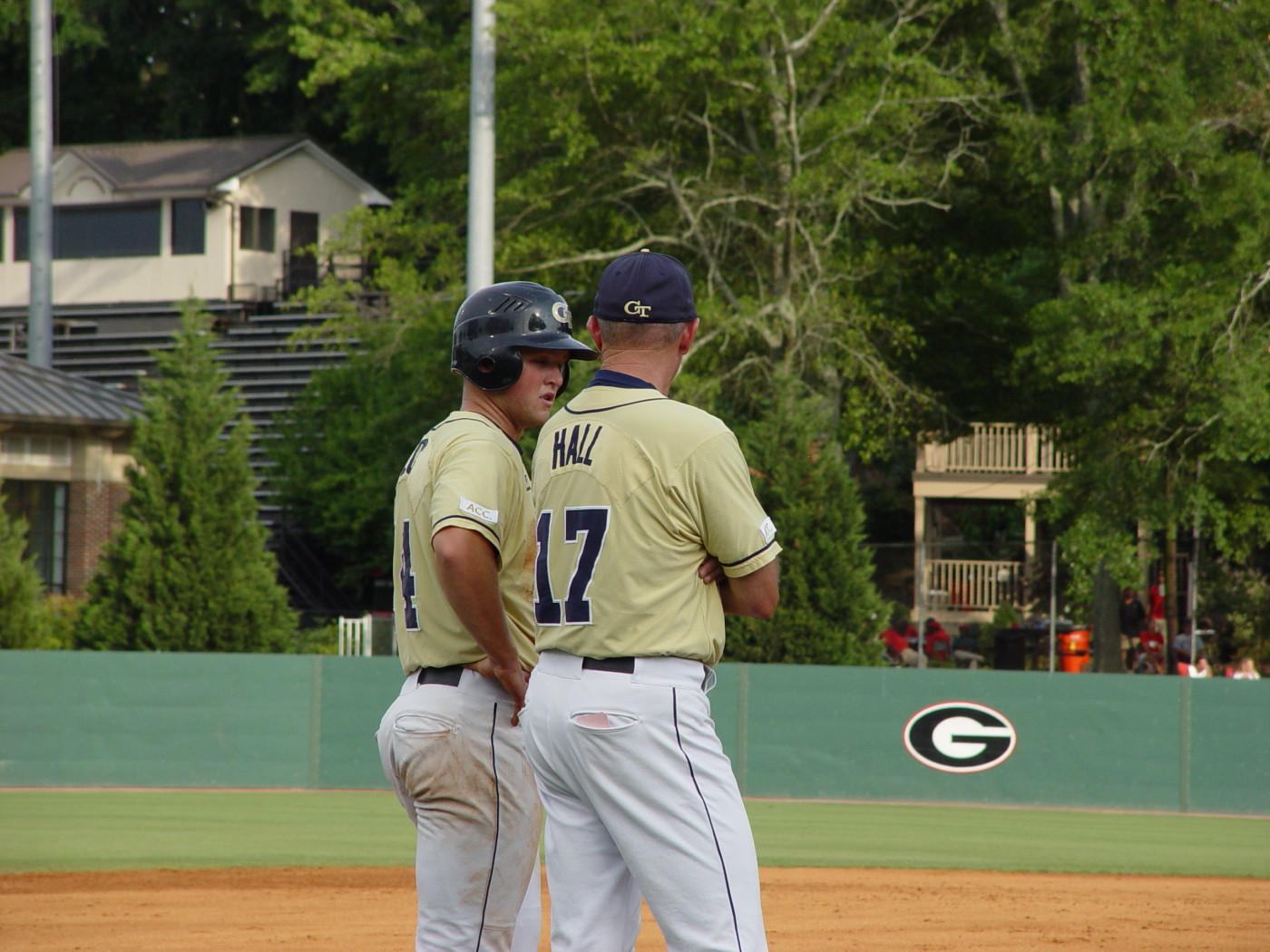 Patrick Long and Danny Hall confer at third base during a Tech scoring threat in the aecond inning of the Jackets' NCAA regional game with Georgia, June 1, 2008.