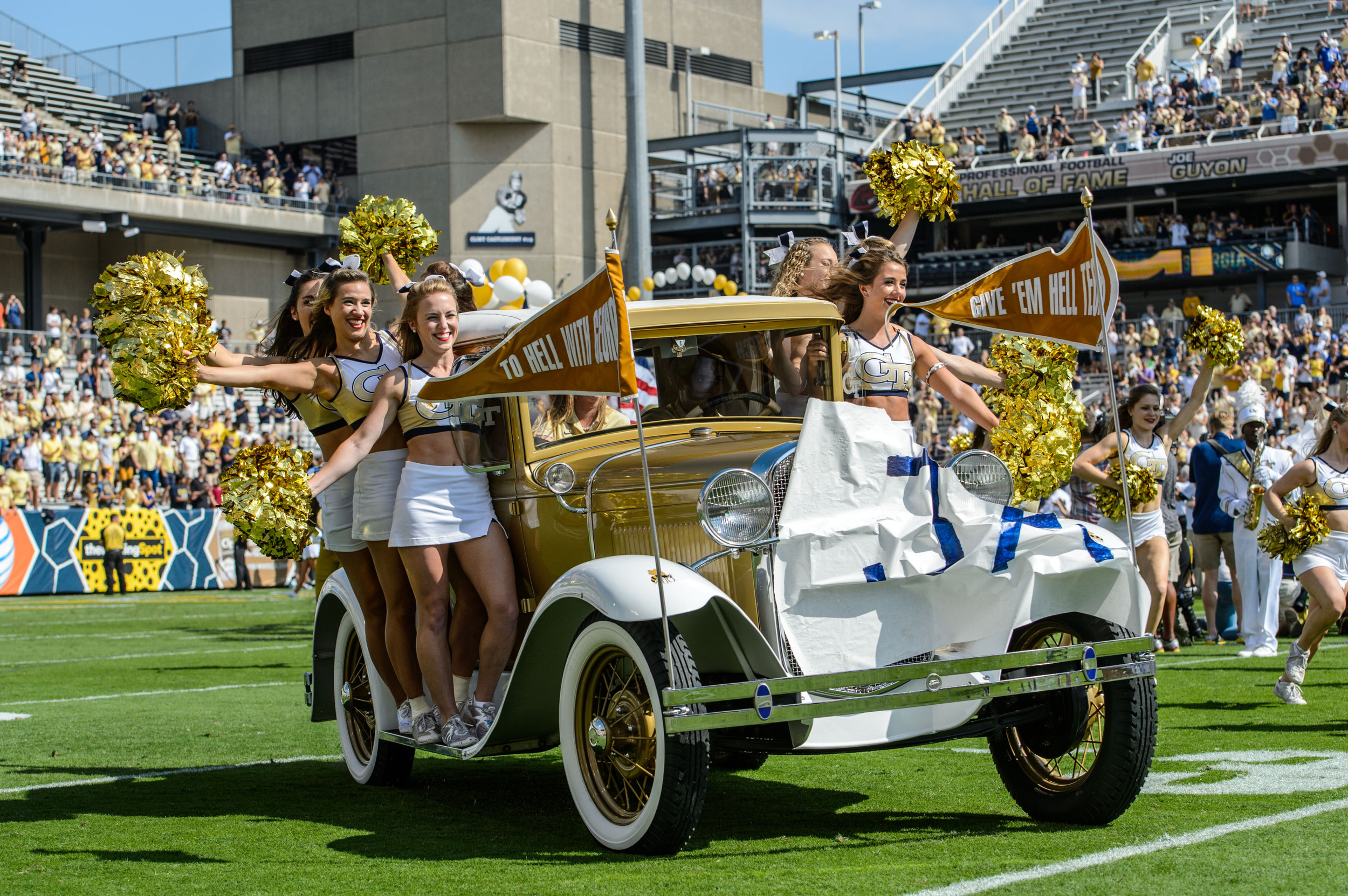 The Ramblin' Reck leads the team onto the field