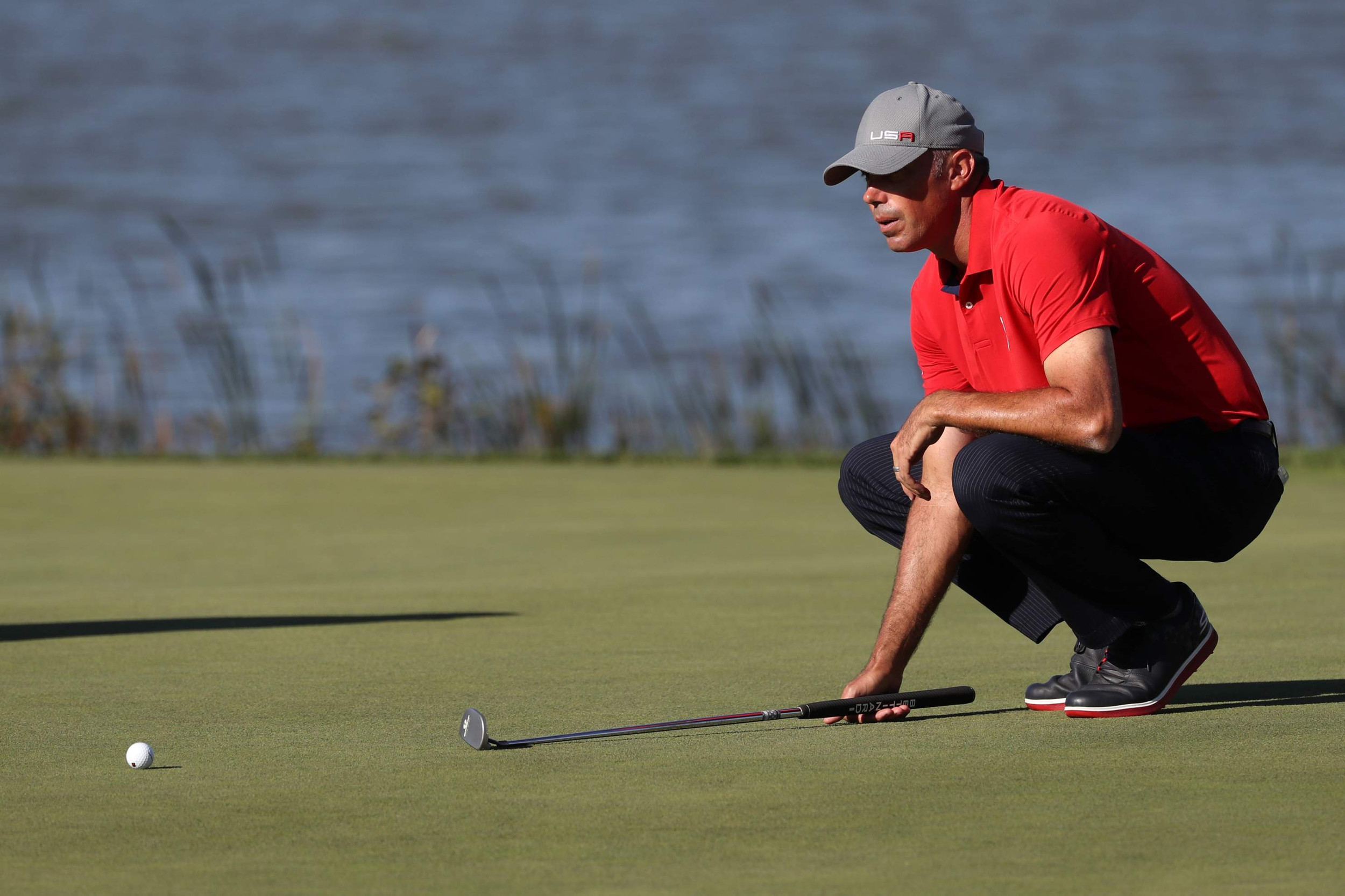 Matt Kuchar lines up a putt during the 41st Ryder Cup at Hazeltine National Golf Club. Credit: Rob Schumacher-USA TODAY Sports