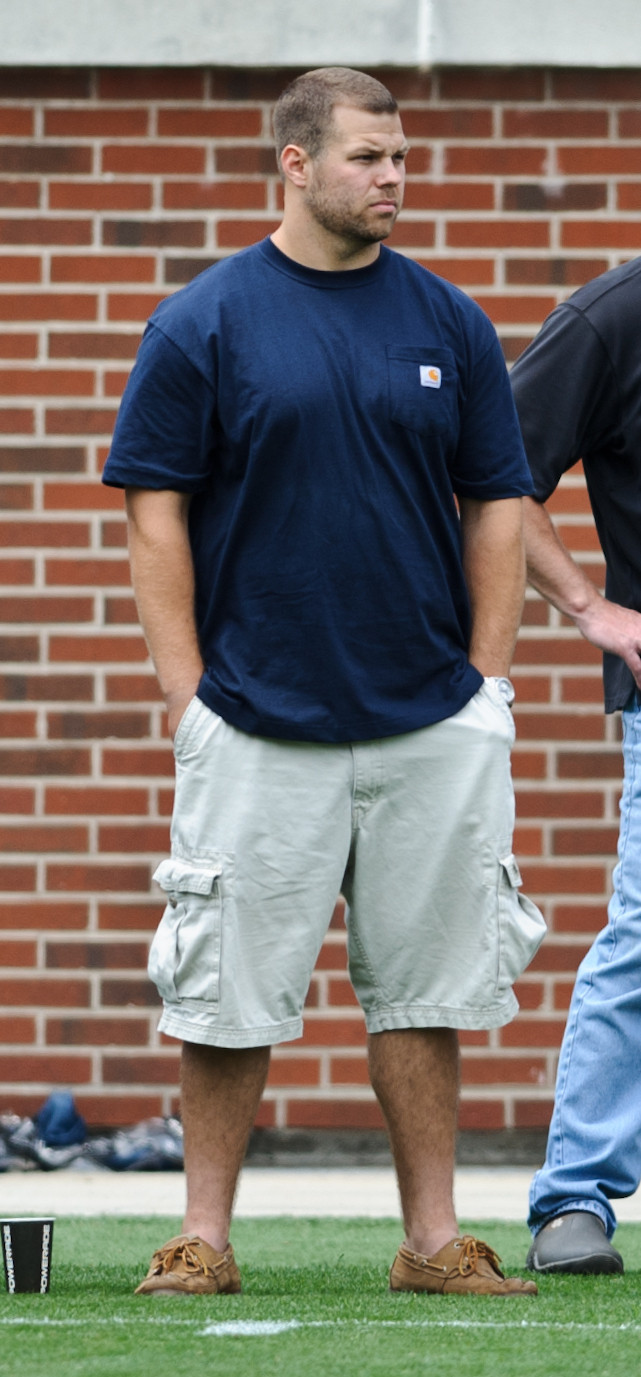 Former Yellow Jacket Ben Anderson watches the game.