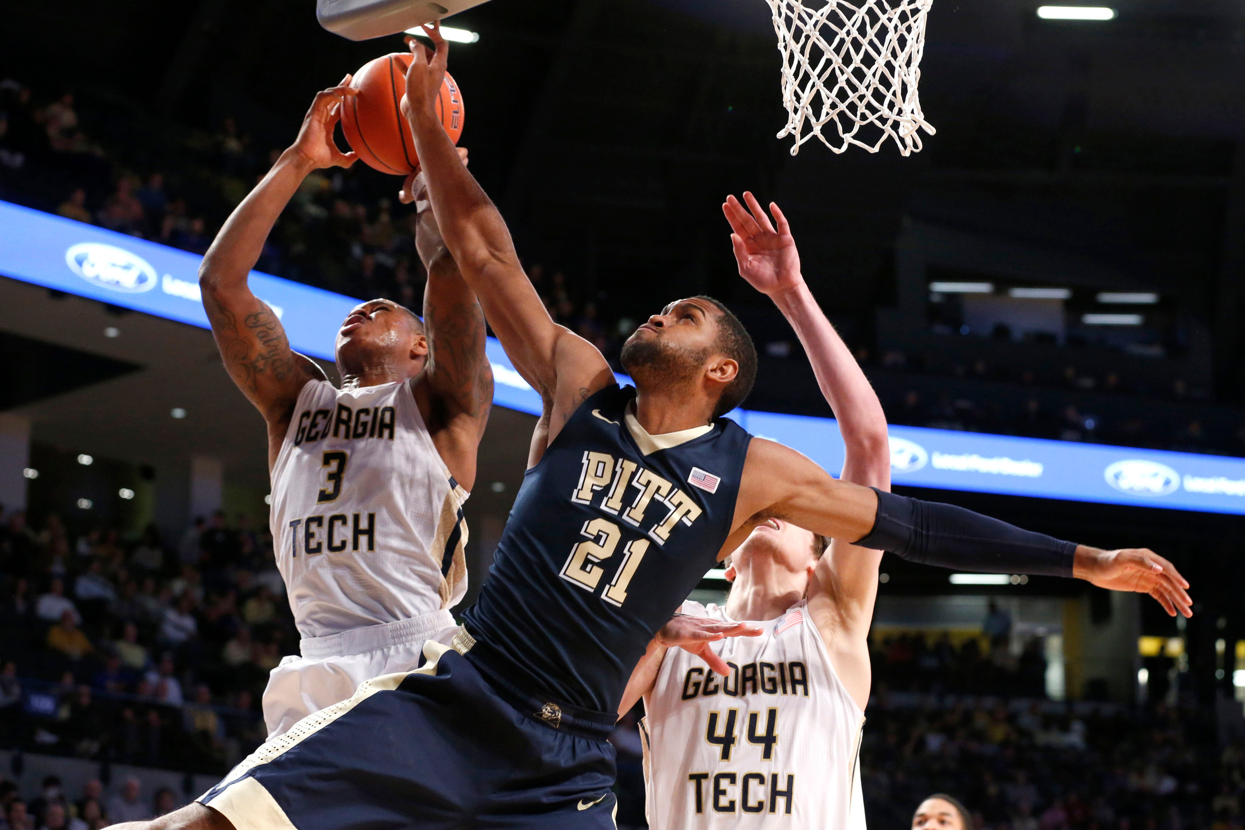 Mar 5, 2016; Atlanta, GA, USA; Pittsburgh Panthers forward Sheldon Jeter (21) battles for a rebound with Georgia Tech Yellow Jackets guard Marcus Georges-Hunt (3). Credit: Jason Getz-USA TODAY Sports