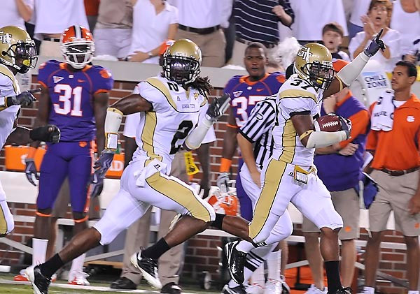 Jerrard Tarrant returns a punt for a touchdown, his 2nd return for a TD in as many games. Photo by LensEffects