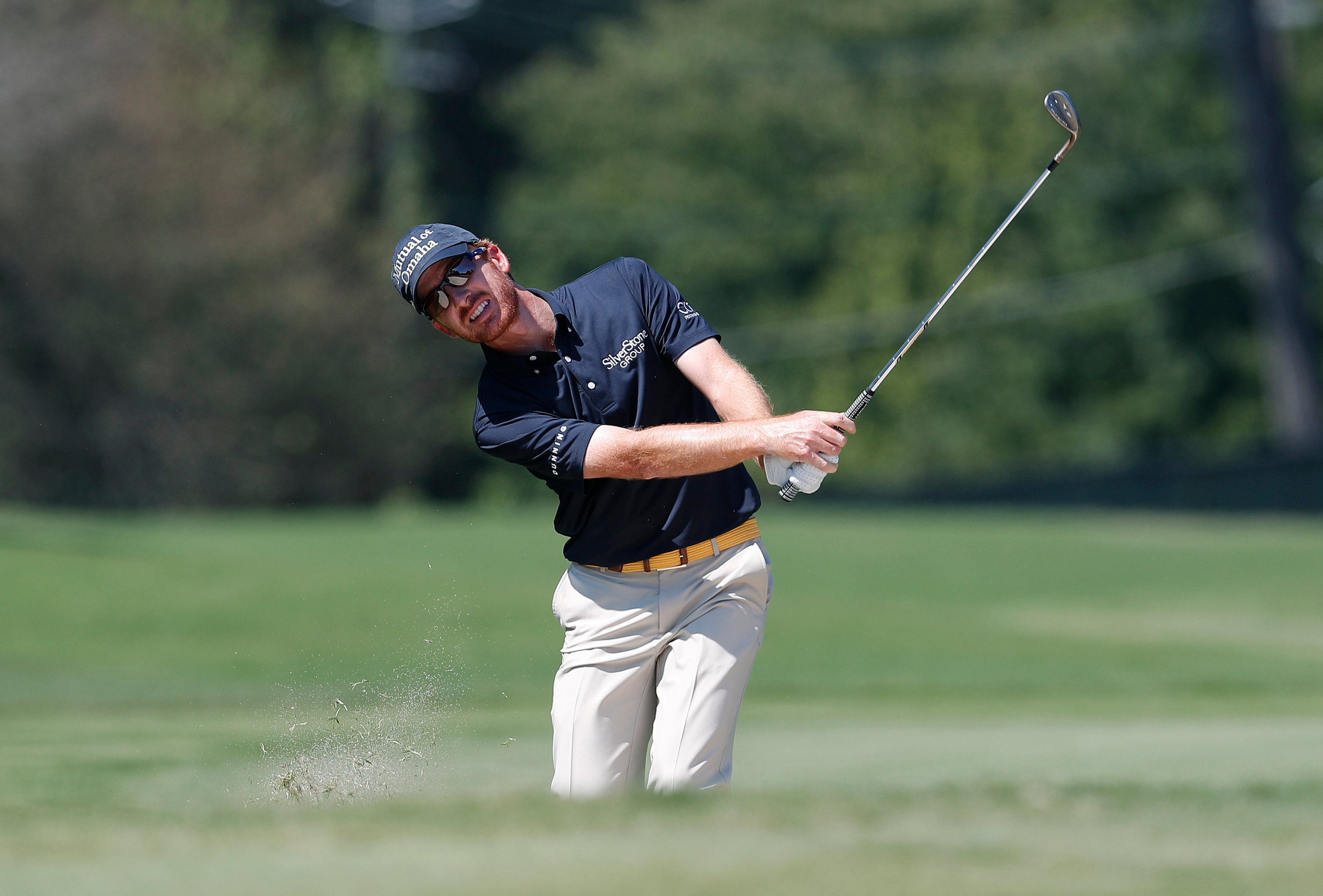 Former Yellow Jacket Roberto Castro chips to the green on the second hole during the final round of play at the Tour Championship golf tournament at East Lake Golf Club Sunday, Sept. 25, 2016, in Atlanta. (AP Photo/John Bazemore)