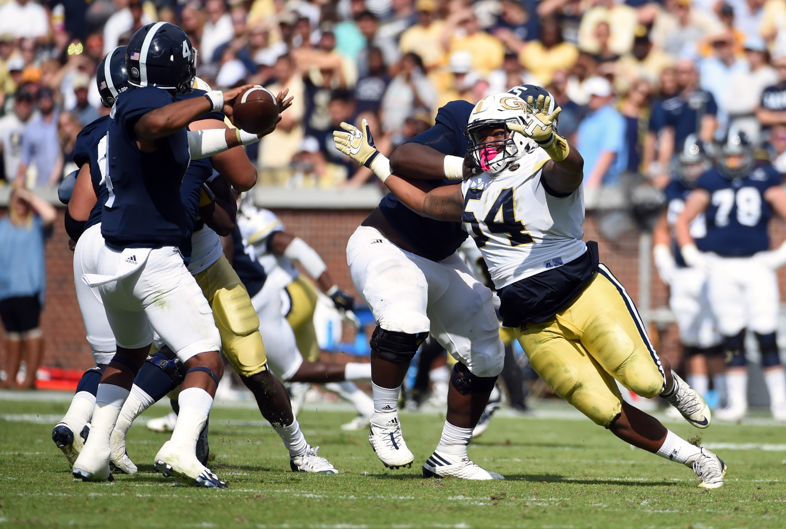Yellow Jackets defensive lineman Kyle Cerge-Henderson (54) pressures Georgia Southern quarterback Kevin Ellison (4) during the second half. Adam Hagy-USA TODAY Sports