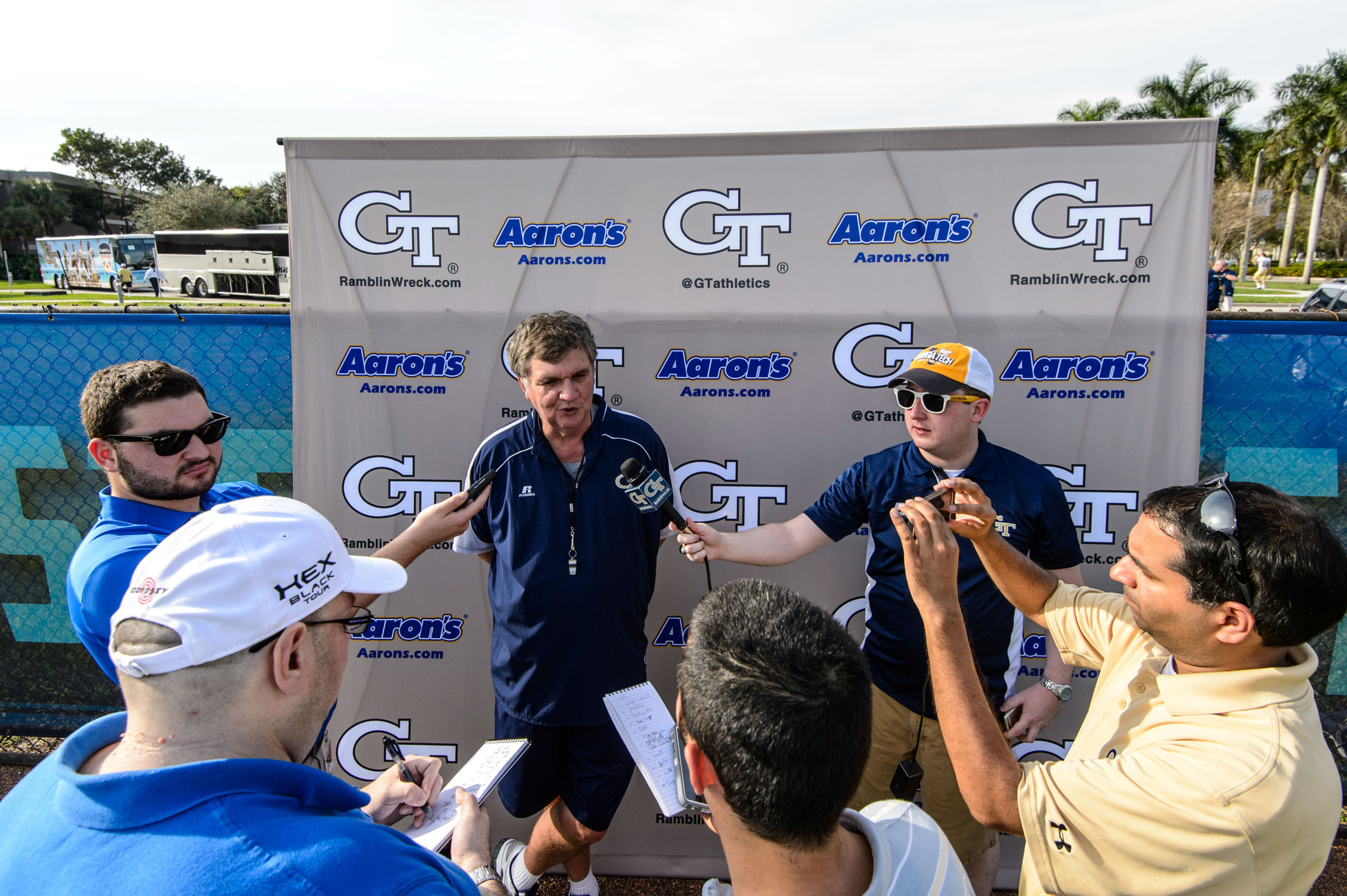 Coach Paul Johnson talks to the media after practice