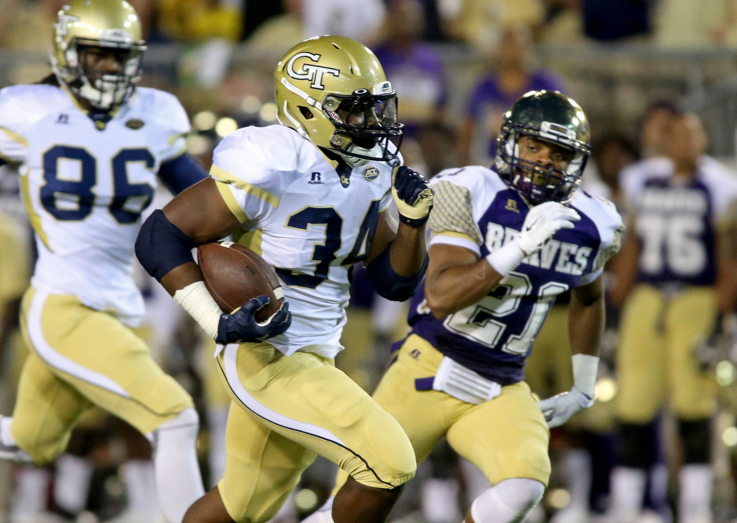 Marcus Marshall (34) runs for a 49-yard touchdown at Bobby Dodd Stadium. Credit: Jason Getz-USA TODAY Sports