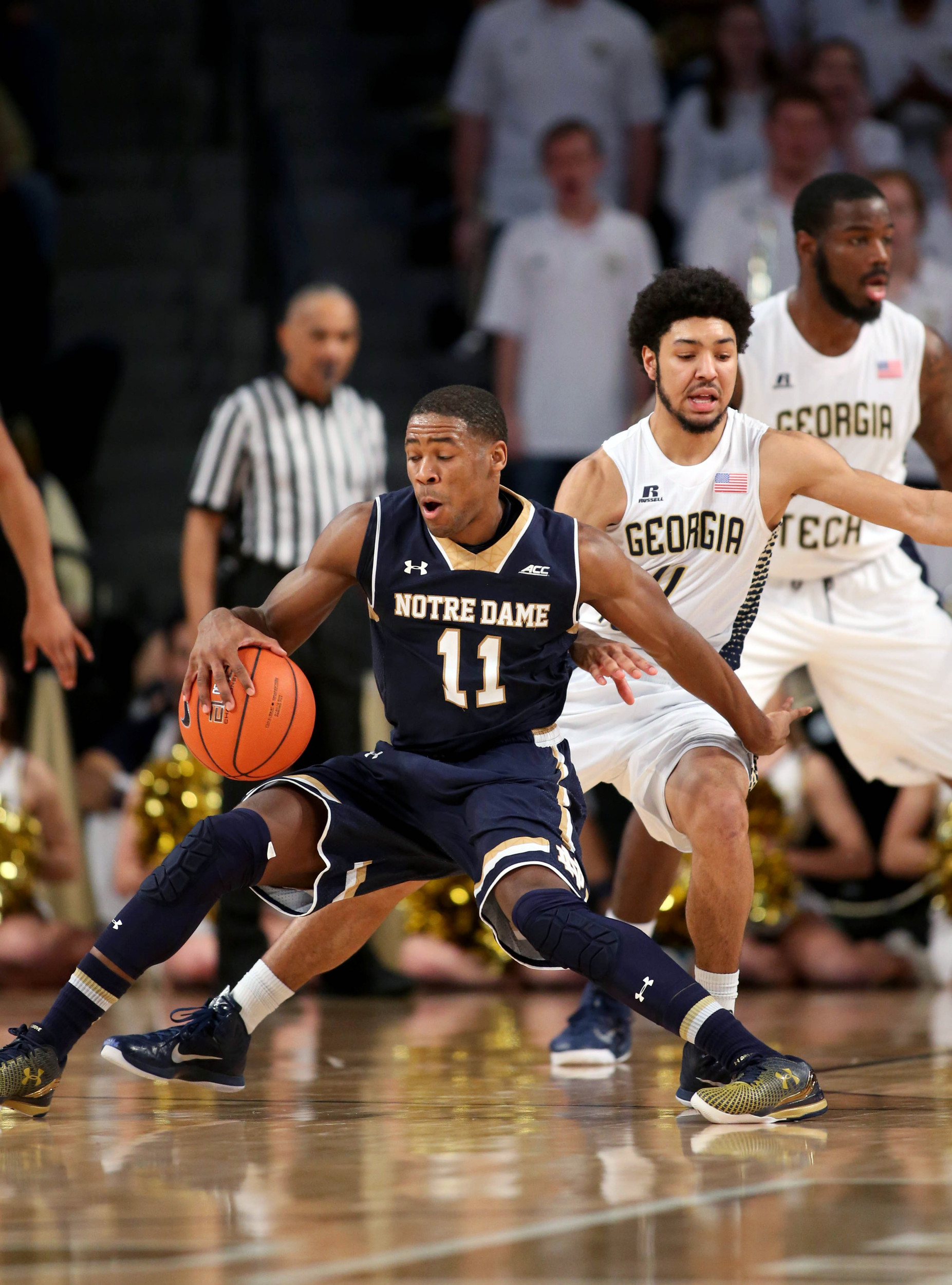 Jan 14, 2015; Atlanta, GA, USA; Notre Dame Fighting Irish guard Demetrius Jackson (11) makes a move against Georgia Tech Yellow Jackets guard Josh Heath (11) in the second half of their game at McCamish Pavilion. Notre Dame won 62-59.