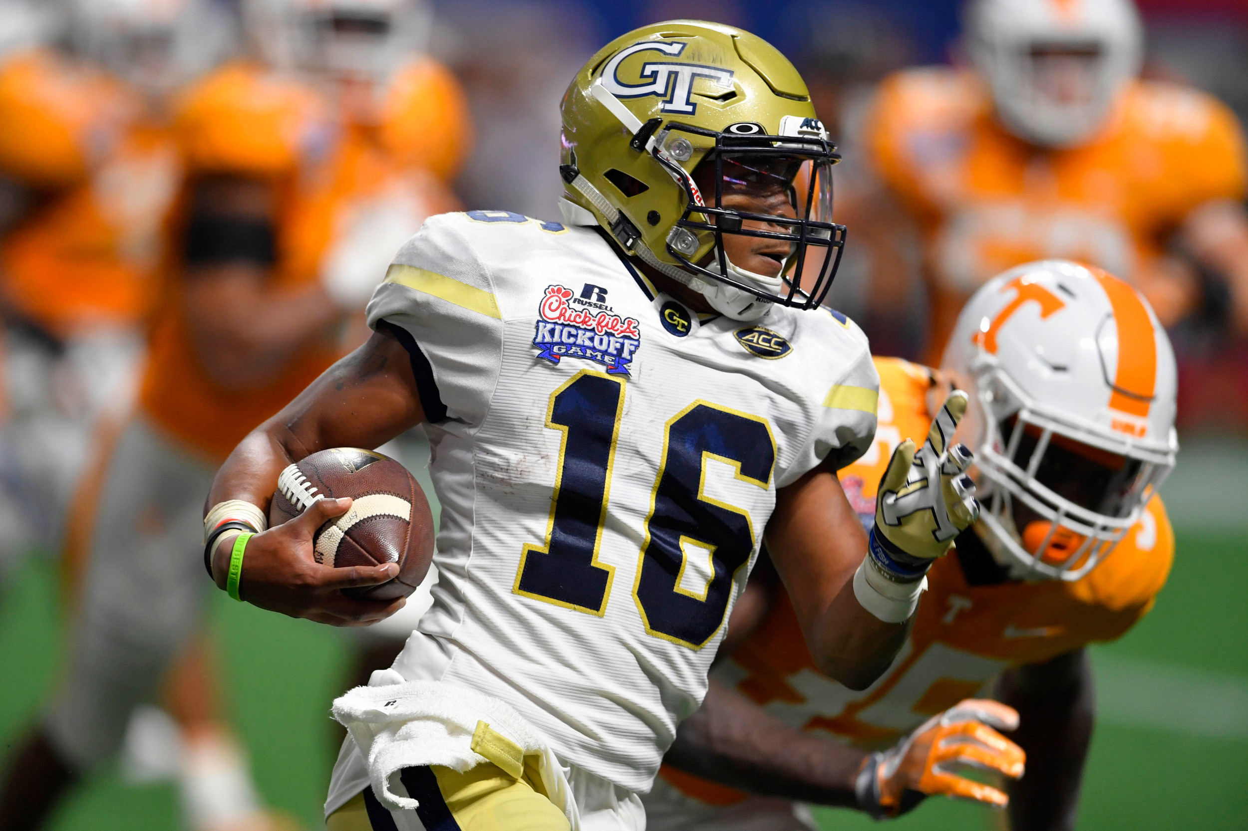 Sep 4, 2017; Atlanta, GA, USA; Georgia Tech Yellow Jackets quarterback TaQuon Marshall (16) runs the ball against the Tennessee Volunteers during the second quarter at Mercedes-Benz Stadium. Mandatory Credit: Dale Zanine-USA TODAY Sports