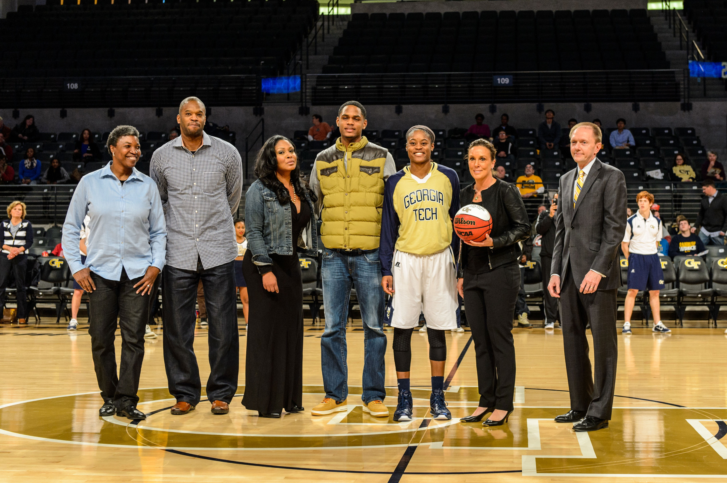 Kaela Davis (3) was honored before the game for reaching 1000 career points