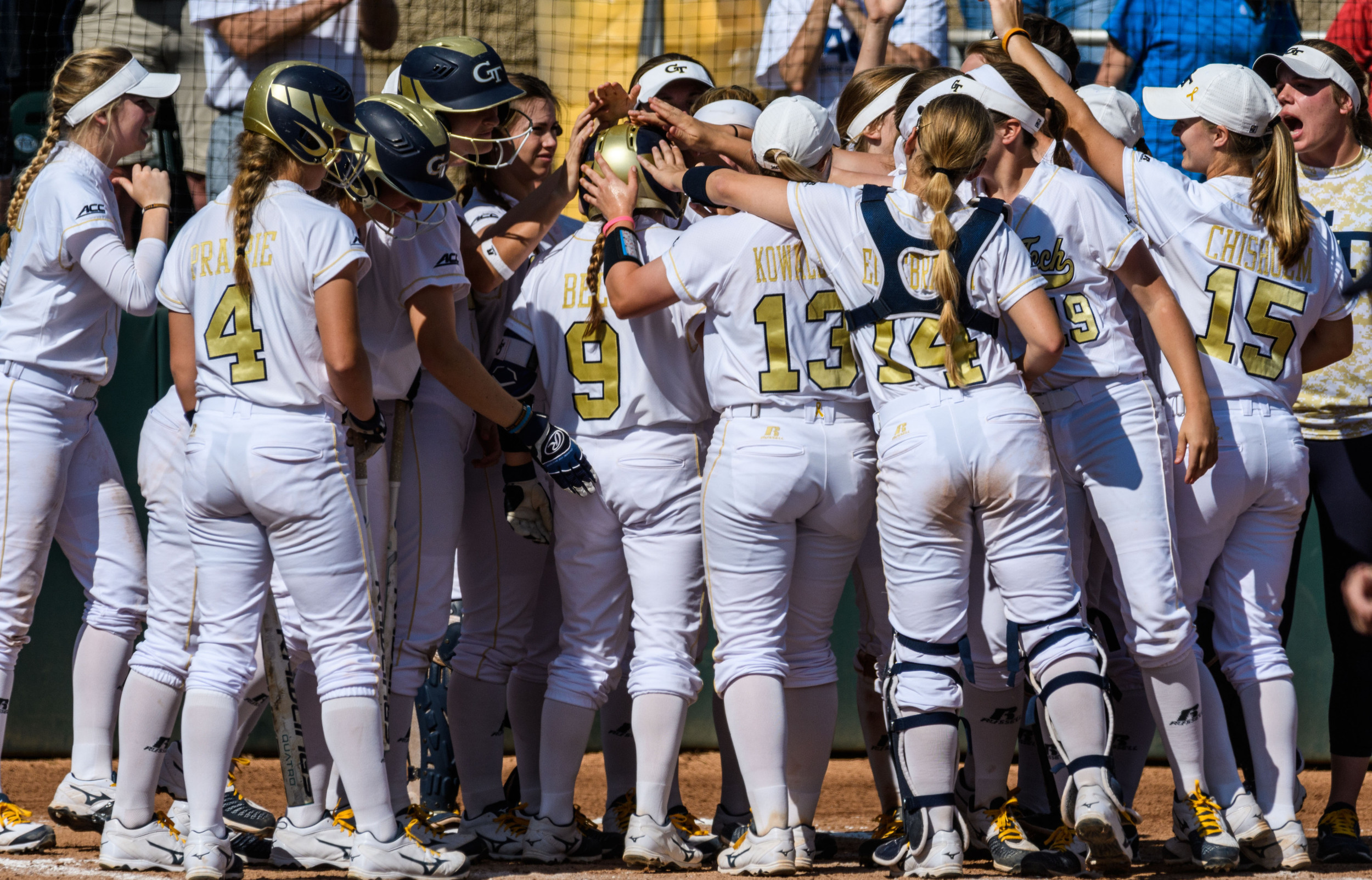 The team celebrates Malea Bell's home run