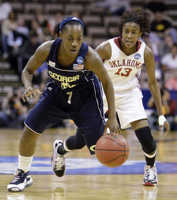 Georgia Tech's Metra Walthour, left, runs down a loose ball ahead of Oklahoma's Danielle Robinson during the first half.