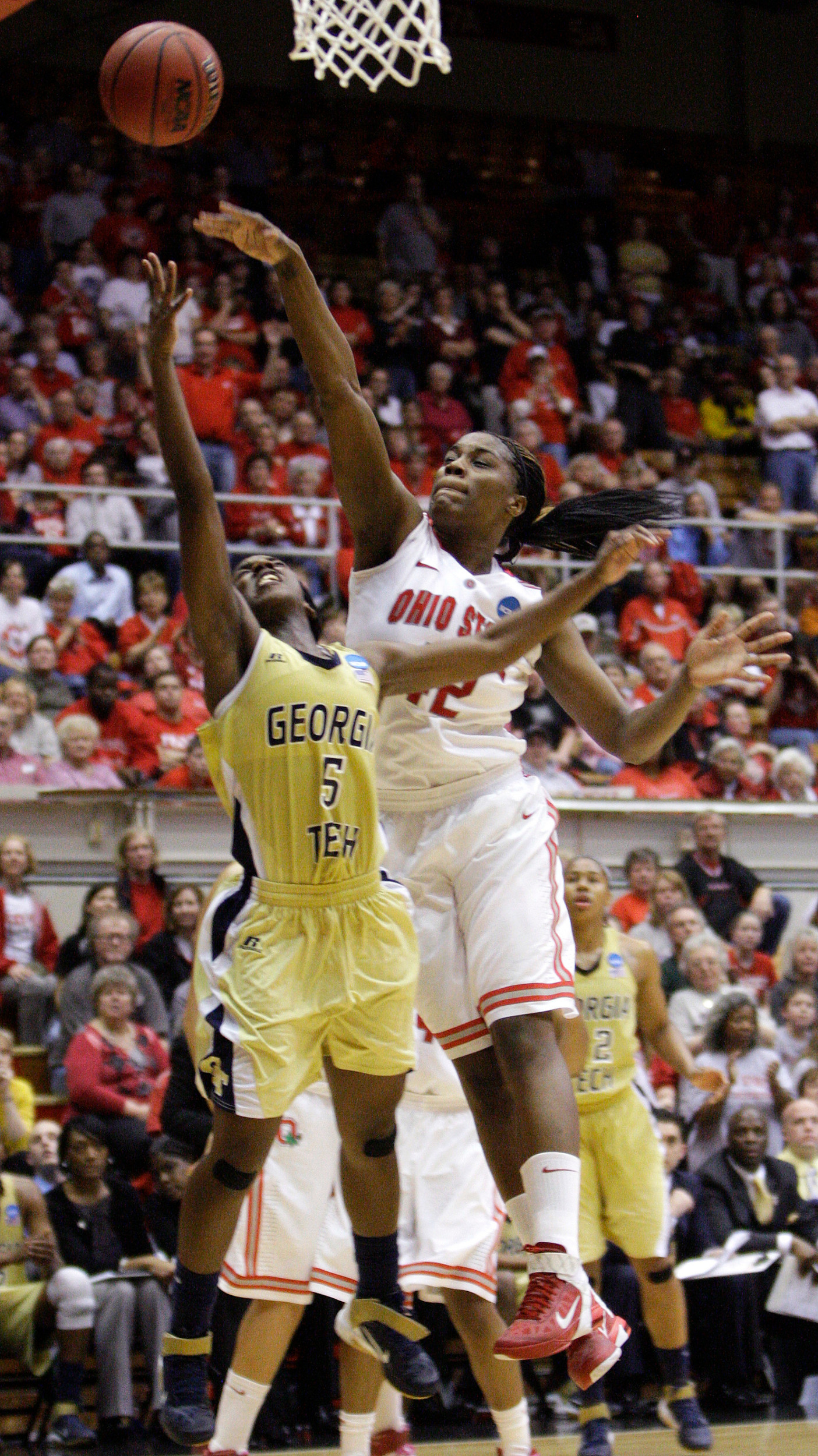 Ohio State's Jantel Lavender, right, blocks the shot of Georgia Tech's Metra Walthour. (AP Photo/Jay LaPrete)