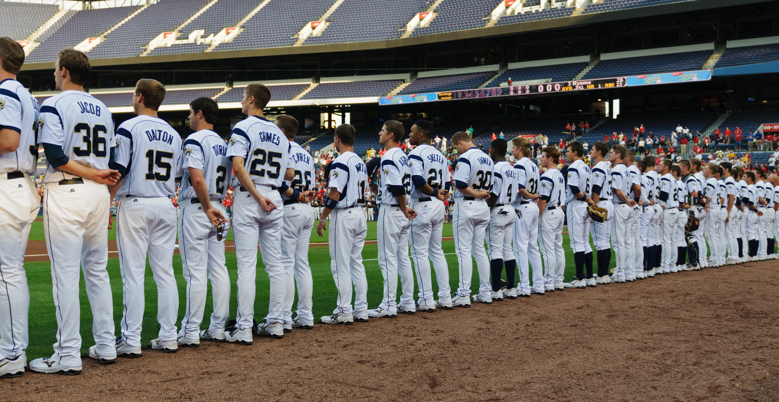The Yellow Jackets honor America during The Star Spangled Banner.