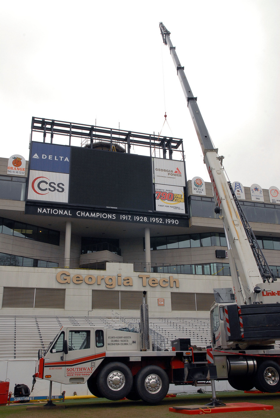 The old video board at Bobby Dodd Stadium comes down. The new one goes up this summer.
