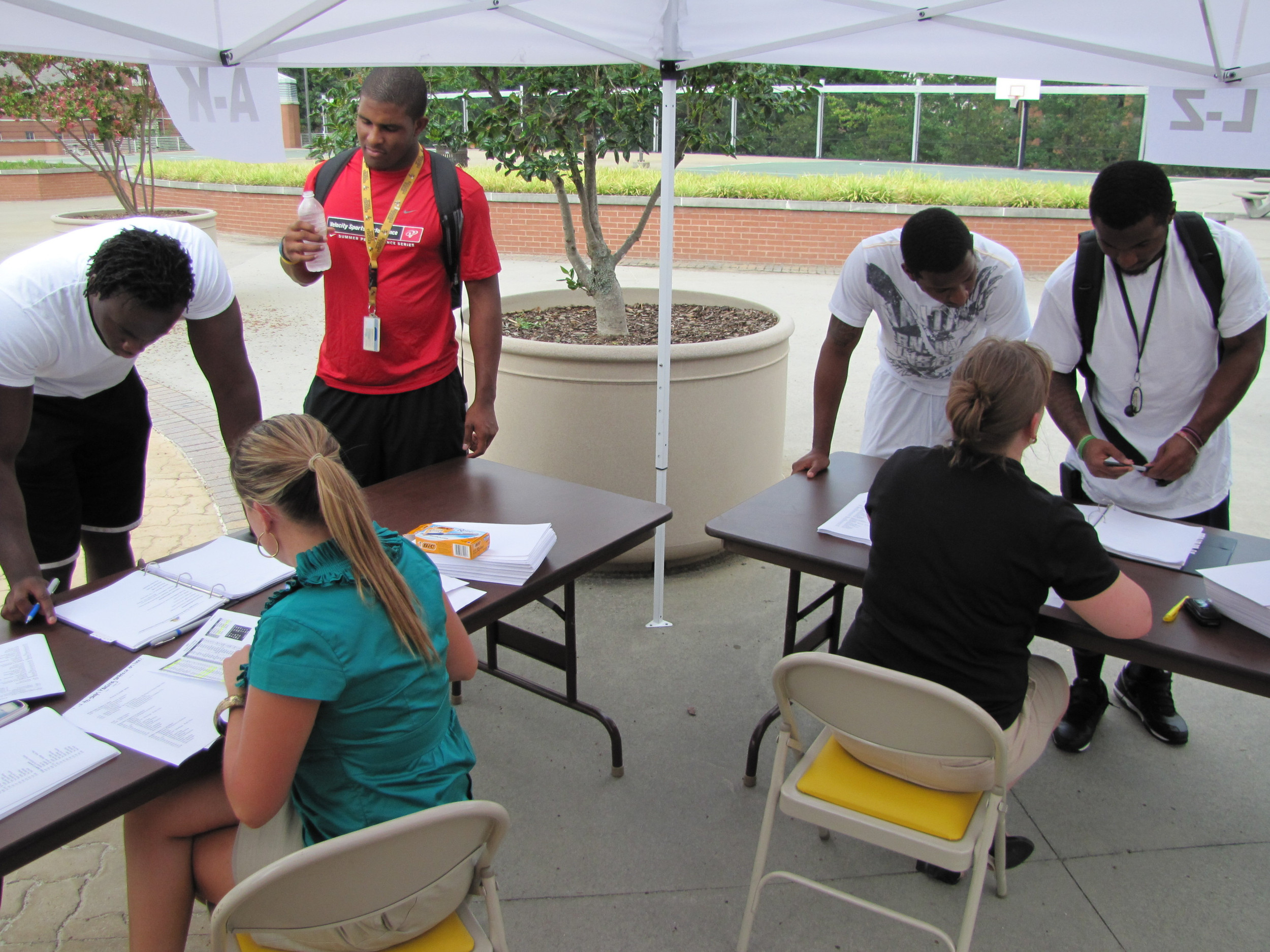 Players sign in on the campus of Georgia Tech on Wednesday, Aug. 4, 2010.