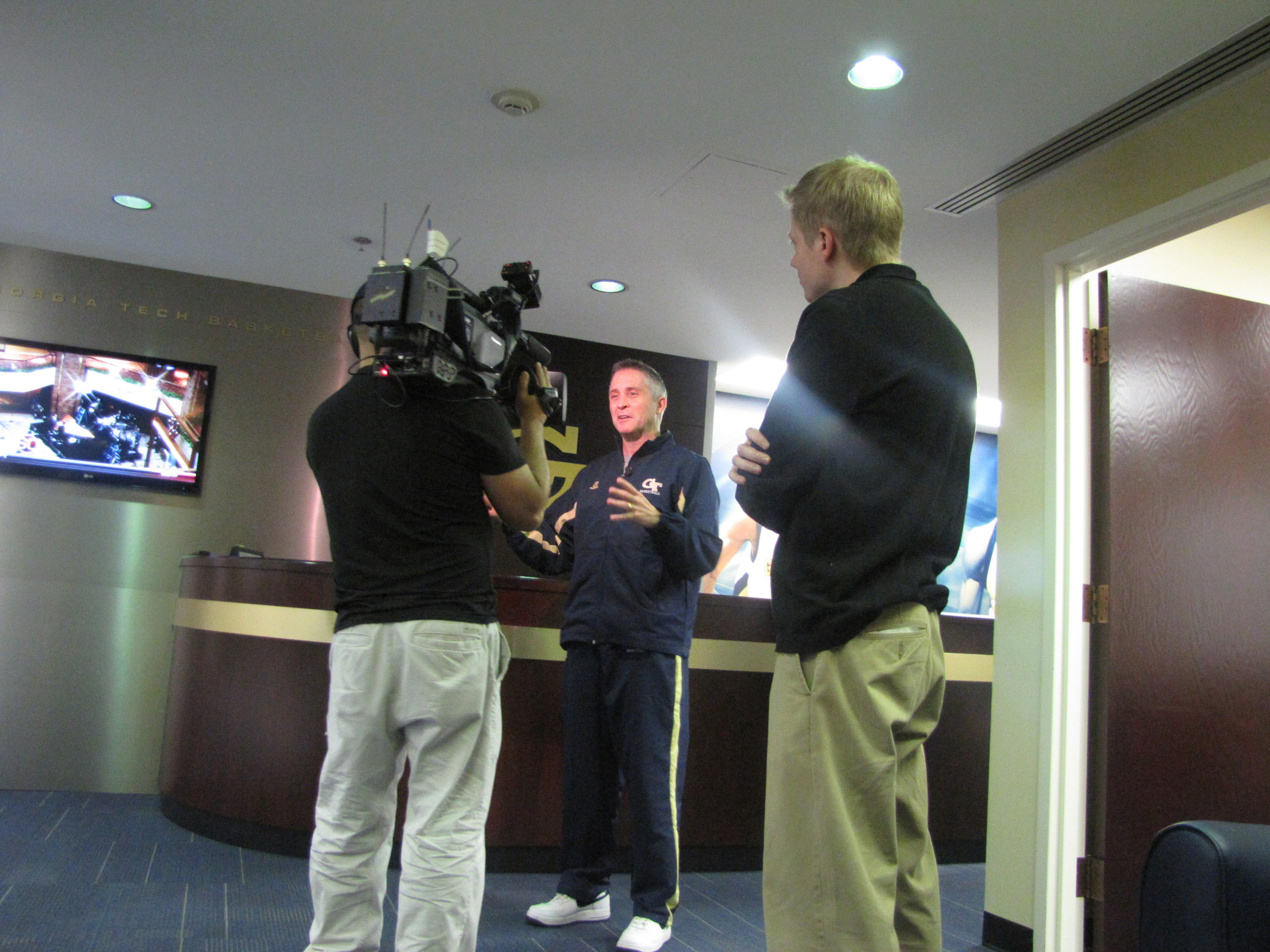 Coach Brian Gregory chats with the FS South crew about the morning's activities.
