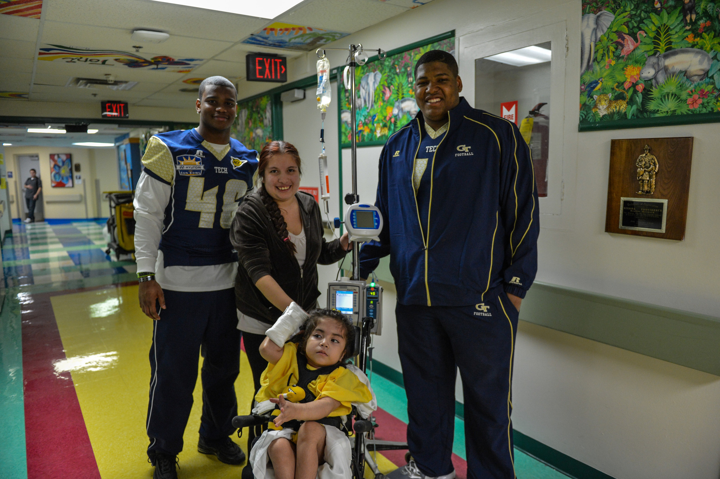 Coach Paul Johnson and 27 Yellow Jacket Football players visited Providence Memorial Hospital in El Paso to spread some Georgia Tech cheer to the children there.