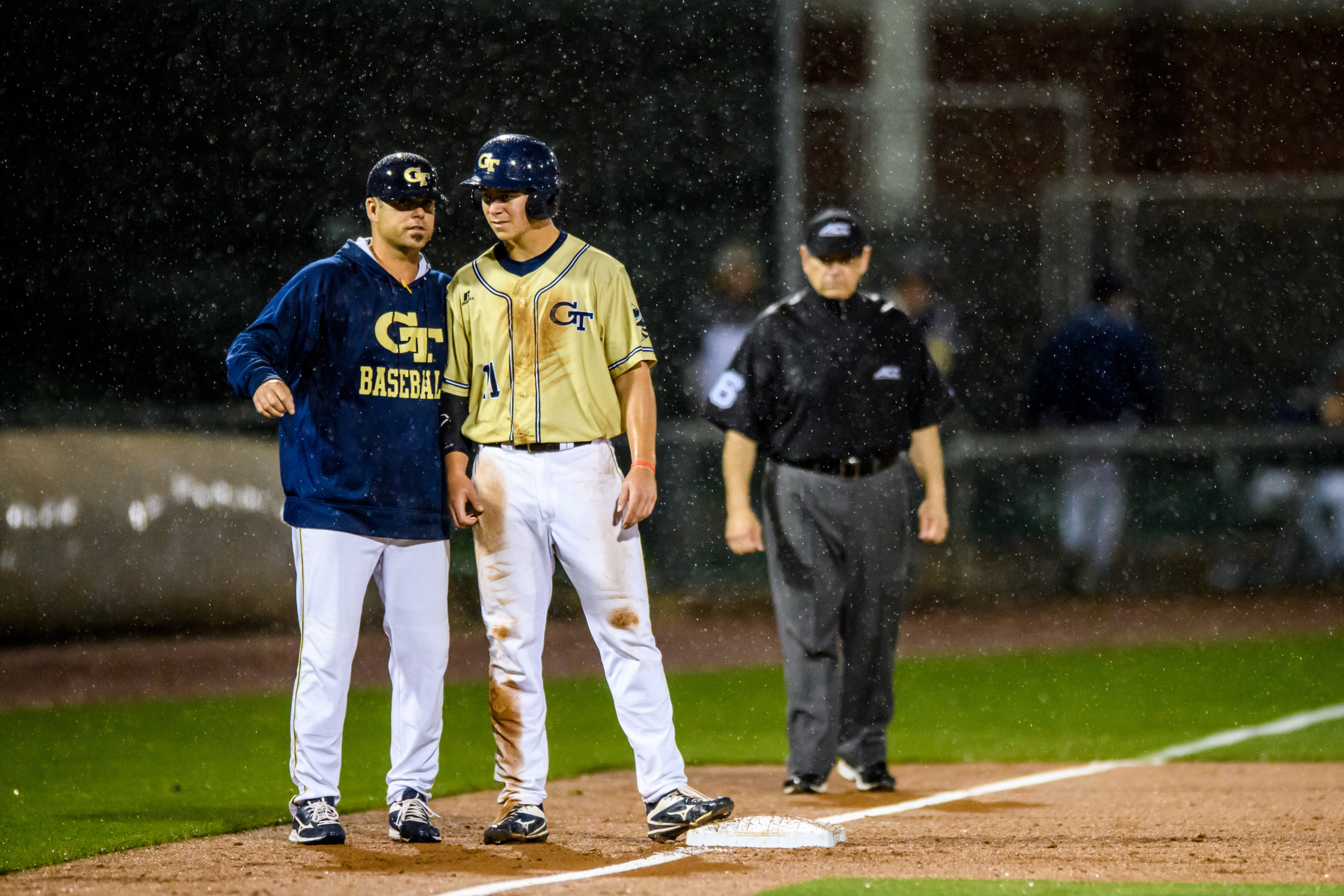 Tristin English (11), Assistant Coach Bryan Prince (18)