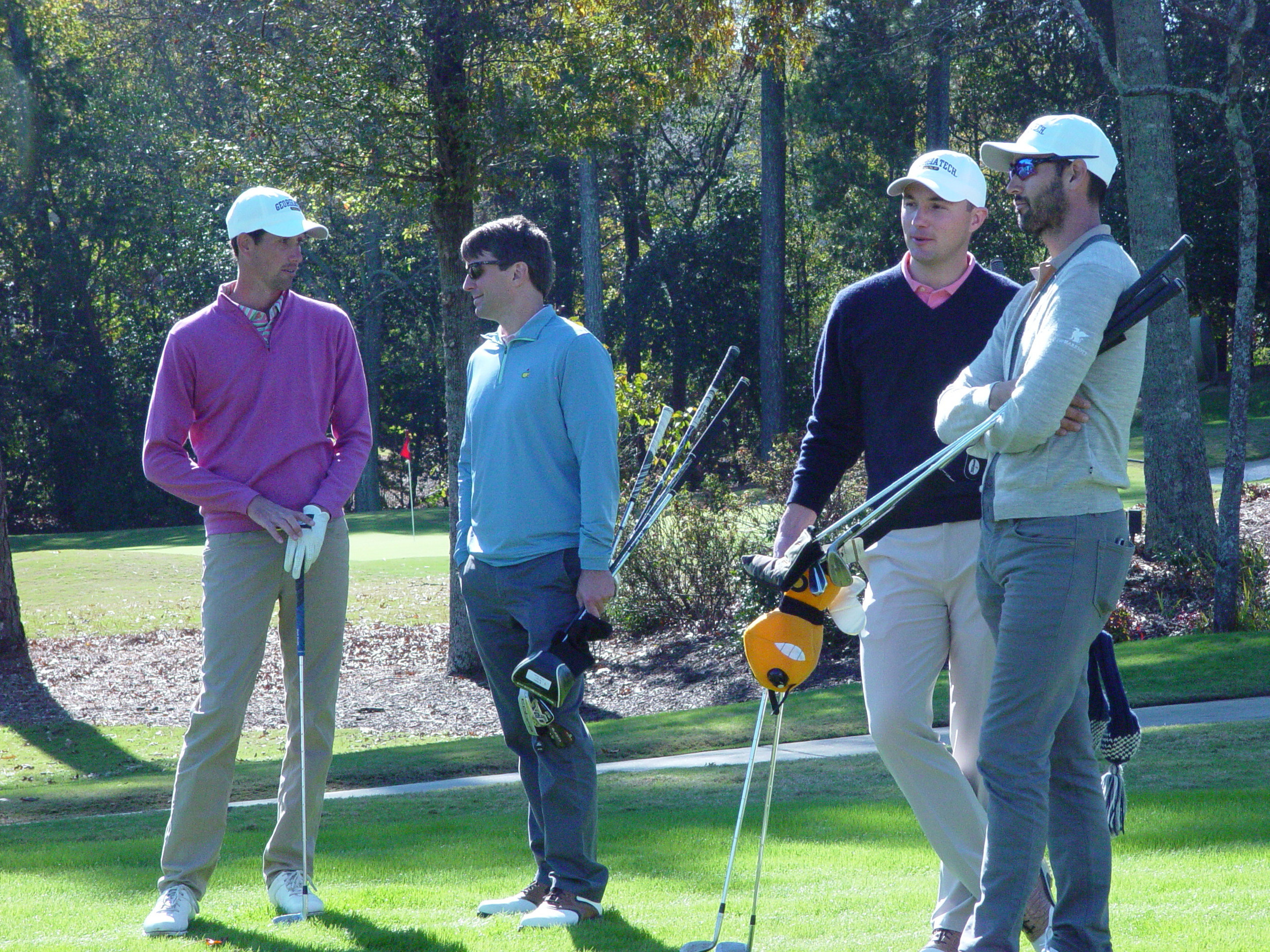 Former Jackets Chesson Hadley (left), Thomas Jordan (2nd from right) and Cameron Tringale (right) at the Ramblin' Wreck Cup, November 12, 2017
