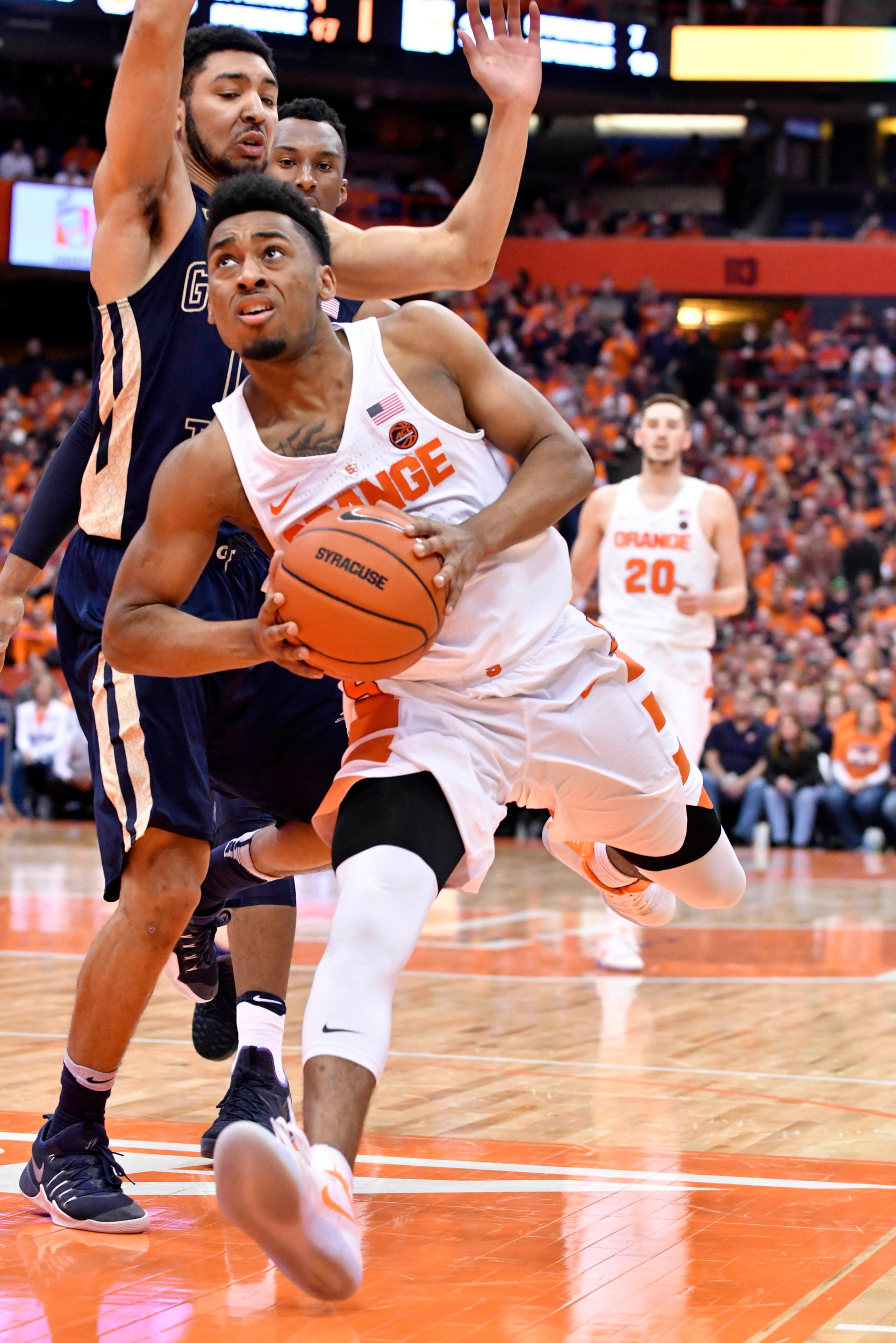 Mar 4, 2017; Syracuse, NY, USA; Syracuse Orange guard John Gillon (4) drives the ball in the lane past Georgia Tech Yellow Jackets guard Josh Heath (11). Mark Konezny-USA TODAY Sports