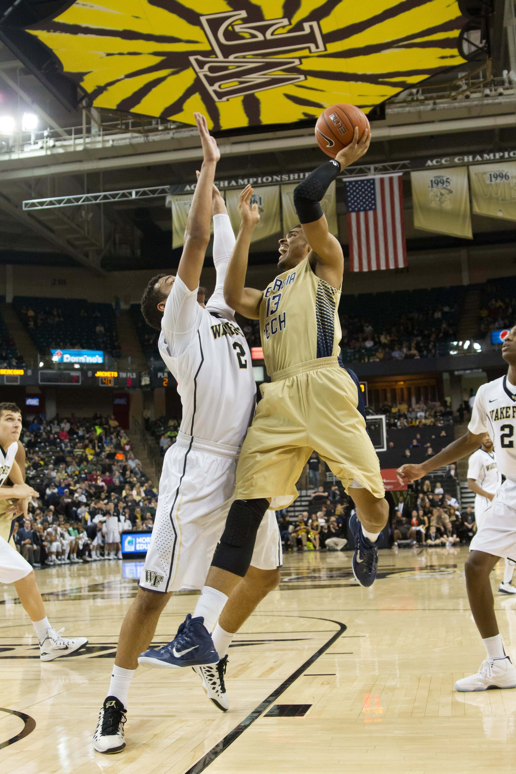 Georgia Tech Yellow Jackets forward Robert Sampson (13) shoots the ball over Wake Forest Demon Deacons forward Devin Thomas (2) during the second half at Lawrence Joel Veterans Memorial Coliseum. Wake Forest defeated Georgia Tech 76-69. Mandatory Credit: Jeremy Brevard-USA TODAY Sports