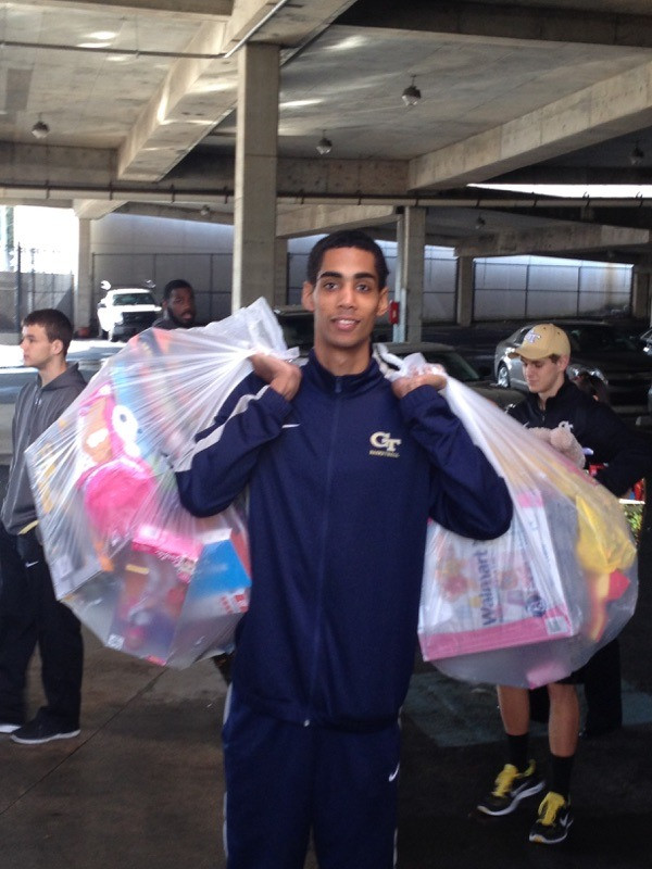 Quinton Stephens - Georgia Tech men's basketball delivering toys to the Atlanta Childrens Shelter as part of the annual Michael Isenhour Toy Drive