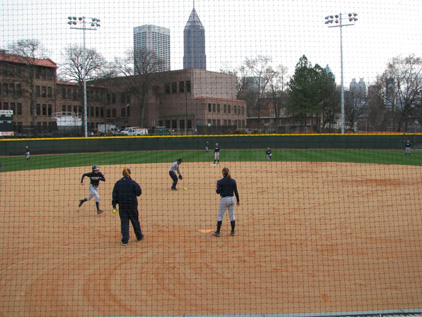 Softball team practices in its new stadium for the first time.